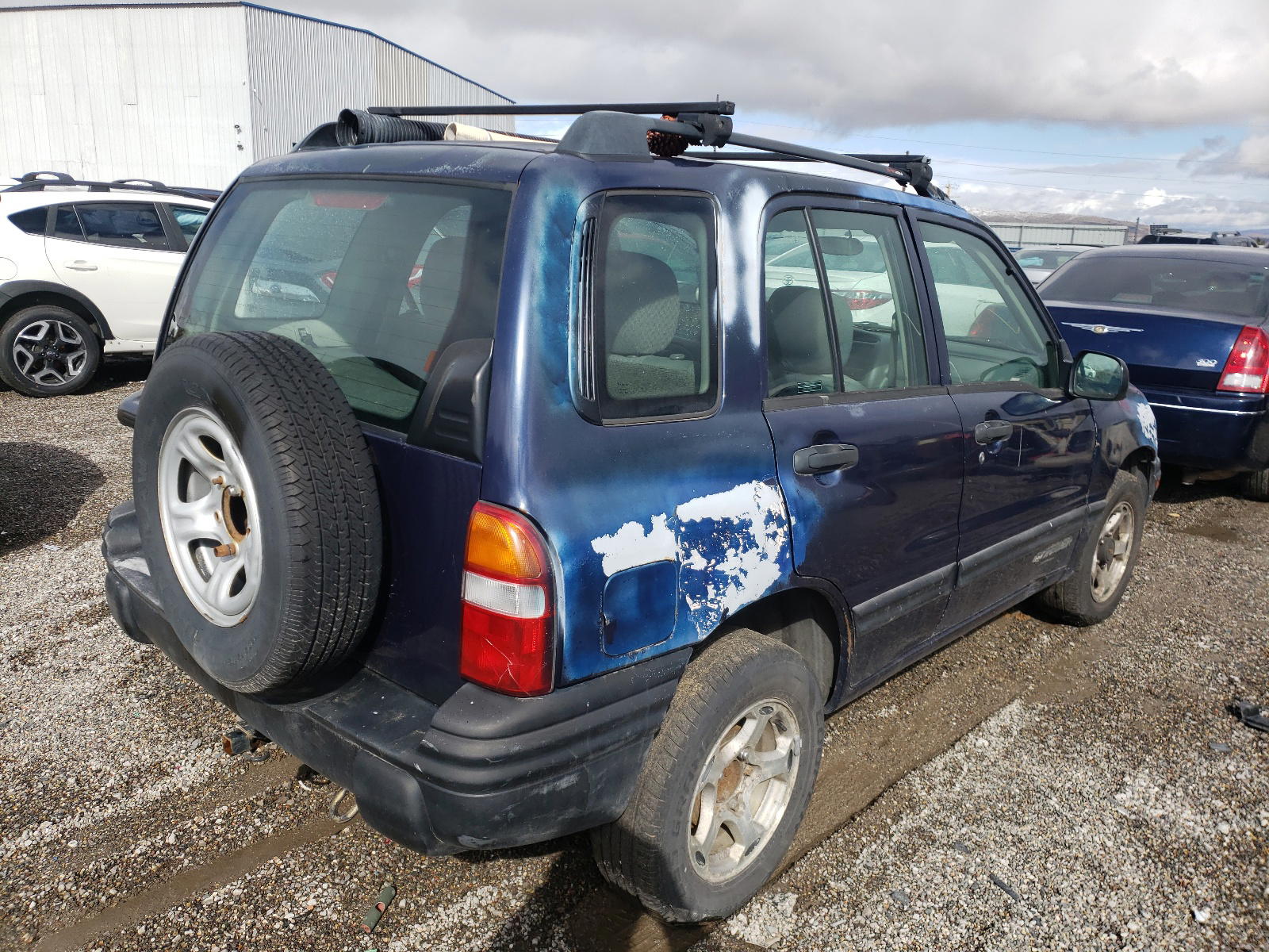 Photo 4 from auction – 2001 CHEVROLET TRACKER with VIN 2CNBJ13C716925431