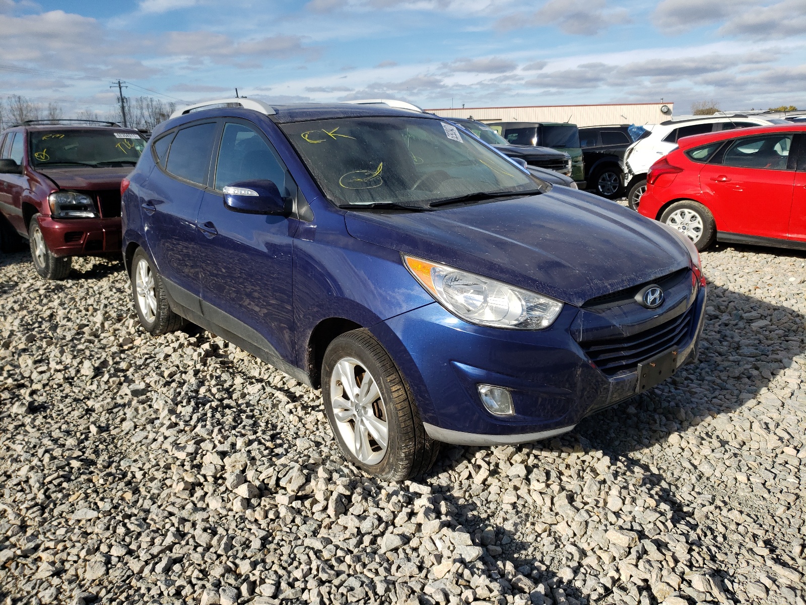 HYUNDAI TUCSON GLS 2013 with VIN KM8JUCAC6DU634569 - Photo from auction