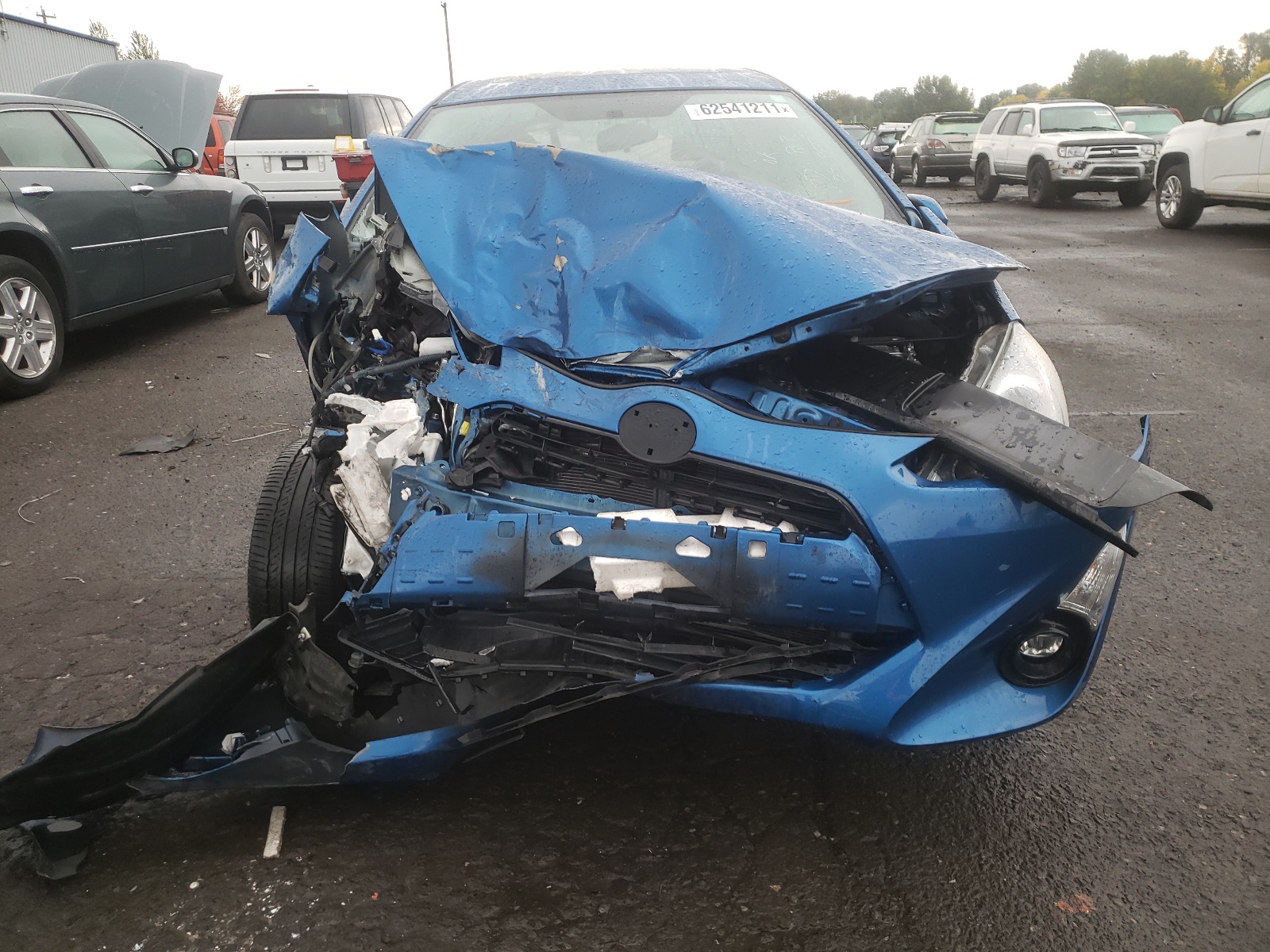 Photo 9 from auction – 2015 TOYOTA PRIUS C with VIN JTDKDTB38F1091768