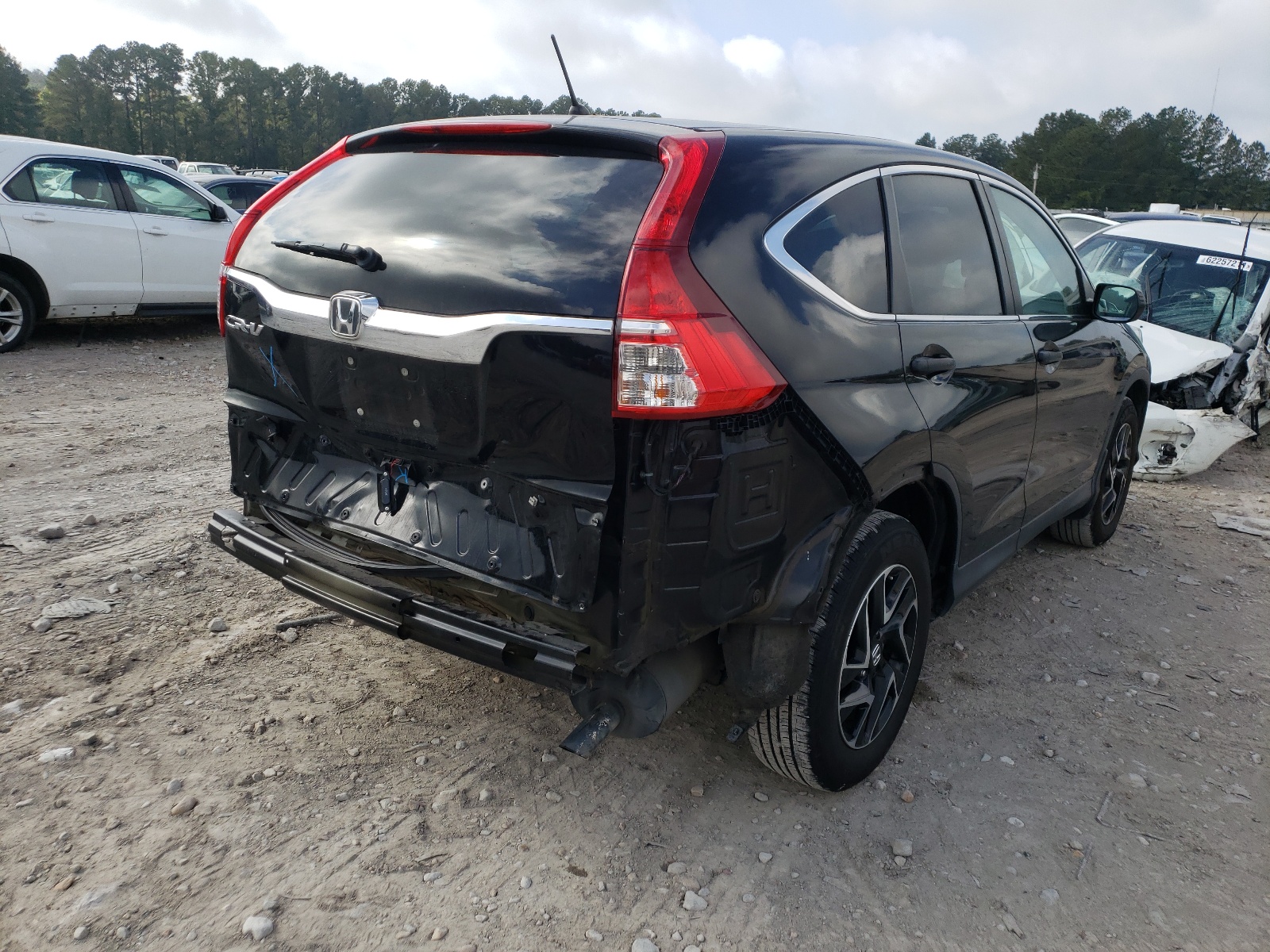 Photo 4 from auction – 2016 HONDA CR-V SE with VIN 2HKRM3H44GH551744