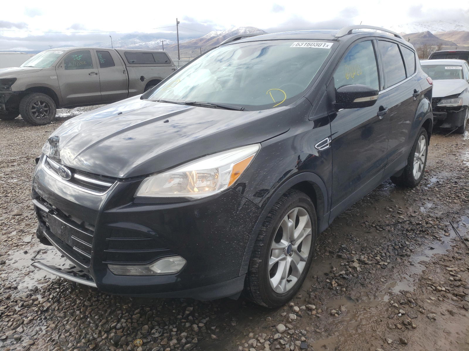 Photo 2 from auction – 2014 FORD ESCAPE TIT with VIN 1FMCU9J92EUC71530