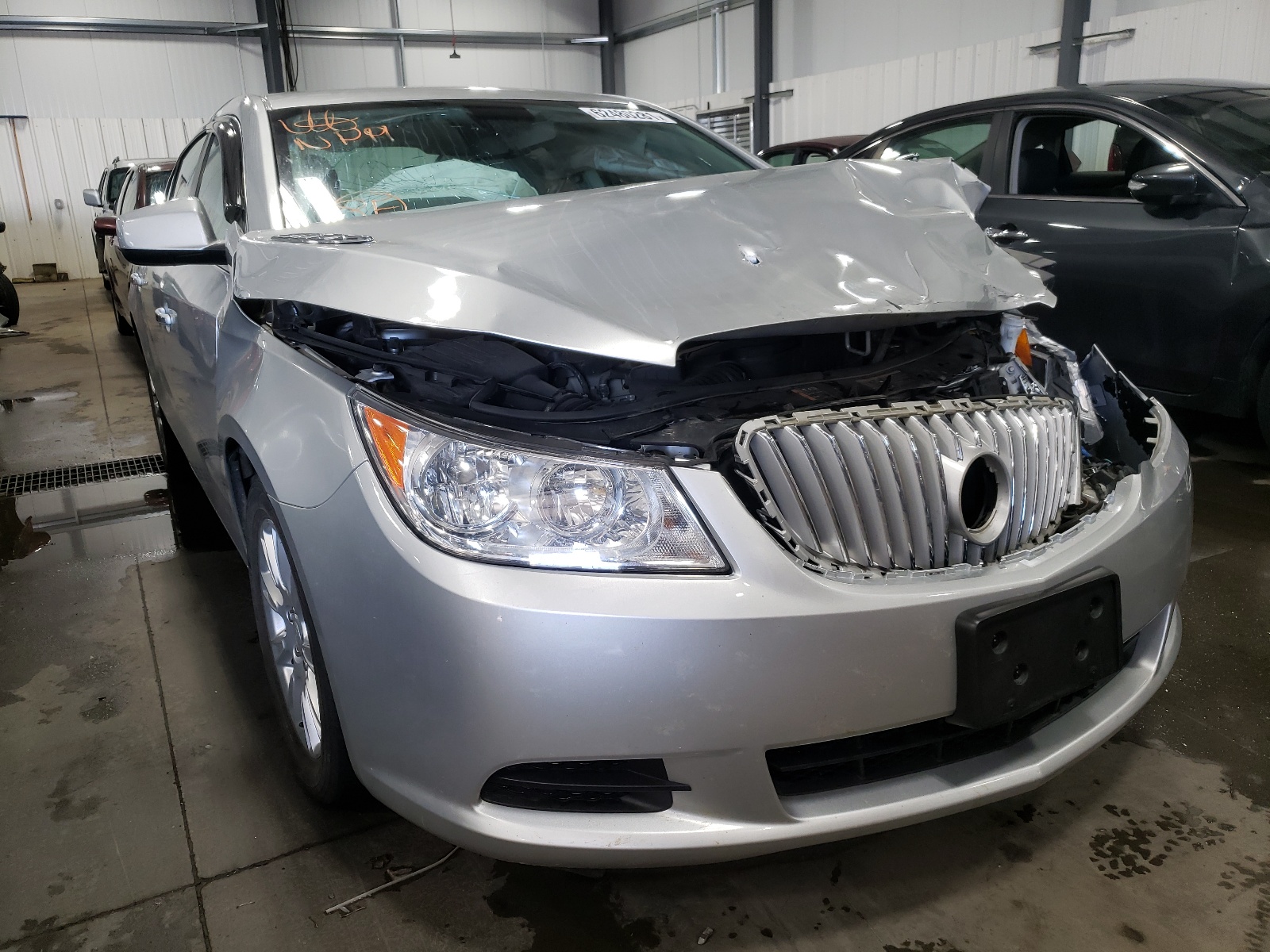 BUICK LACROSSE 2012 with VIN 1G4GA5ER1CF324314 - Photo from auction