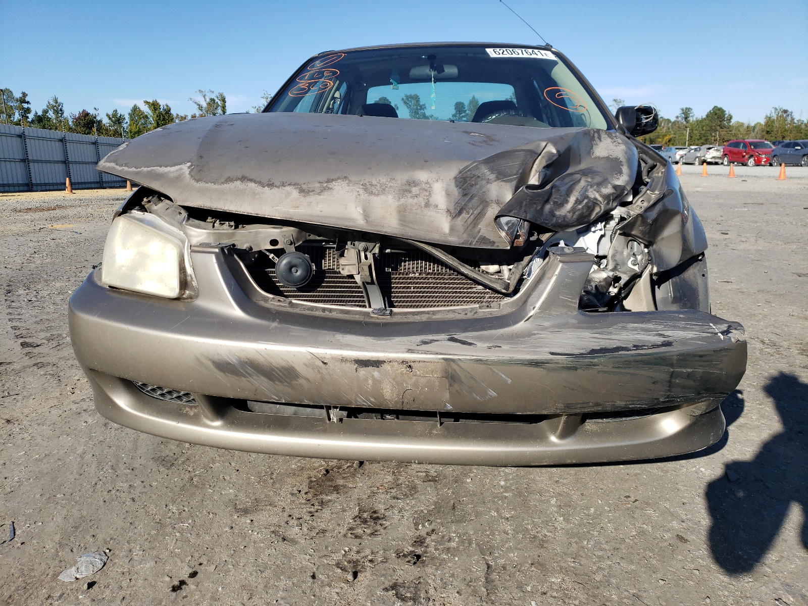 Photo 9 from auction – 2000 MAZDA PROTEGE with VIN JM1BJ2228Y0258228