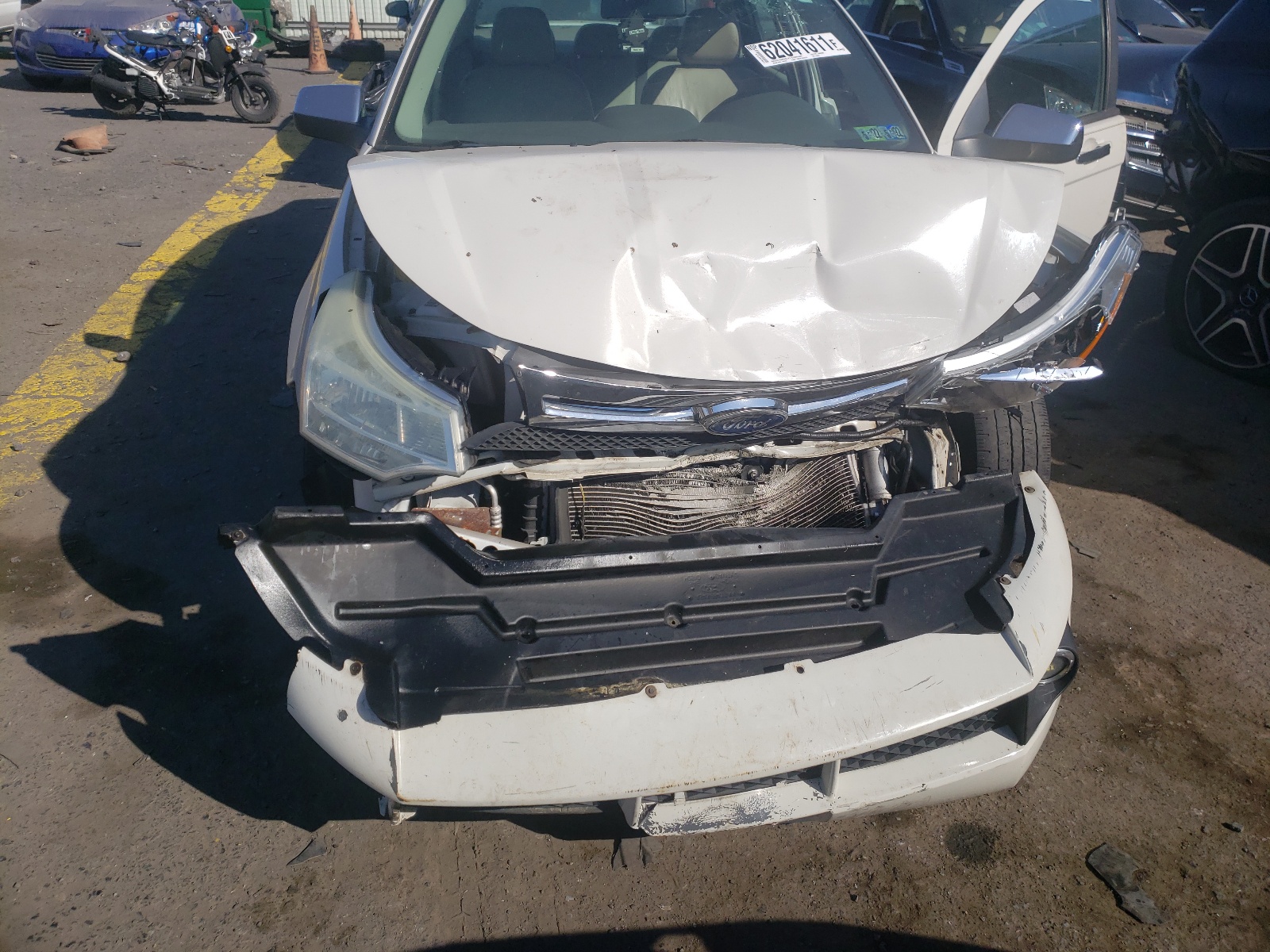 Foto 7 de la subasta – 2011 FORD FOCUS SEL con VIN 1FAHP3HN3BW115083