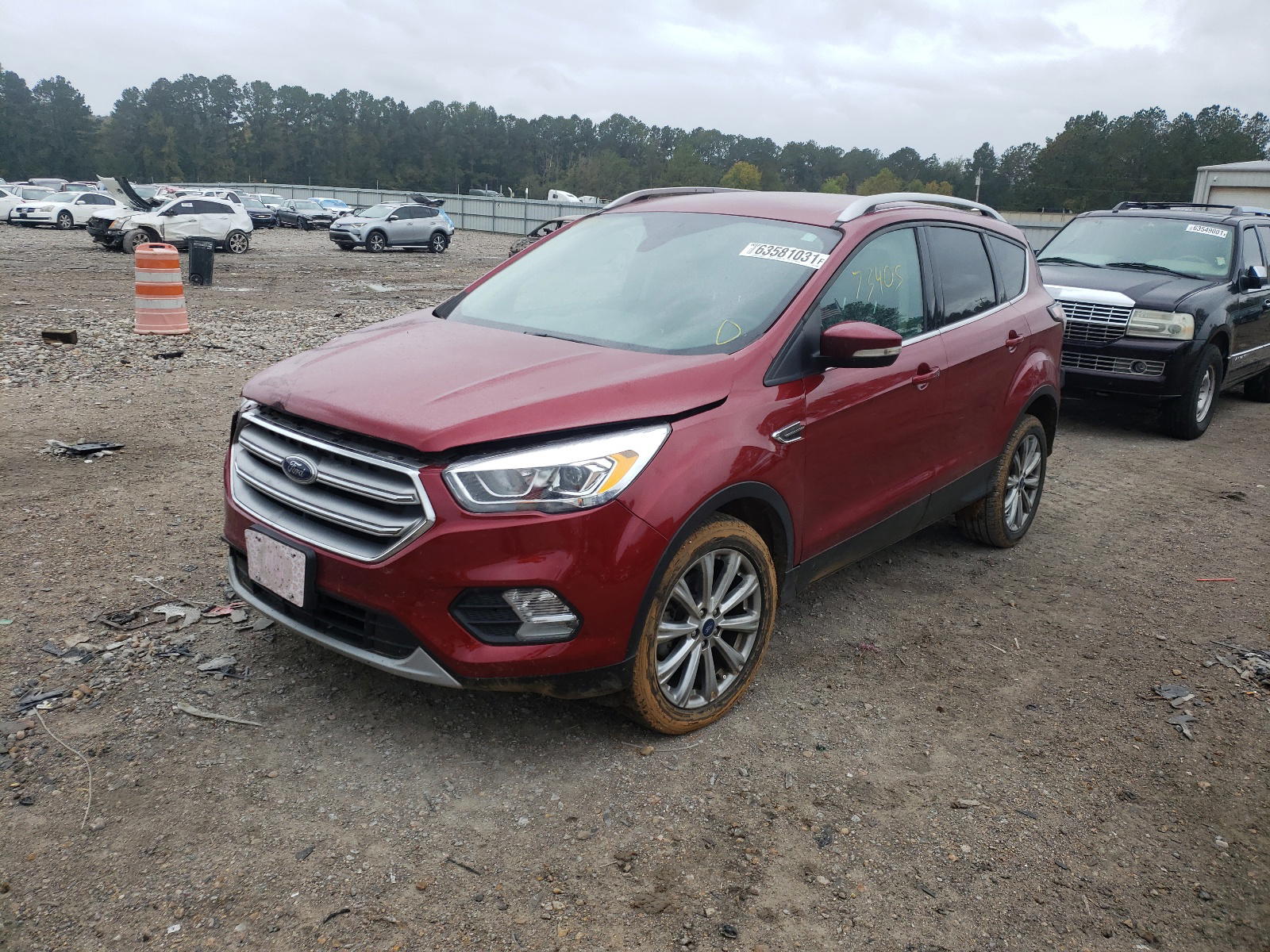 Photo 2 from auction – 2017 FORD ESCAPE TIT with VIN 1FMCU0JD0HUB76288