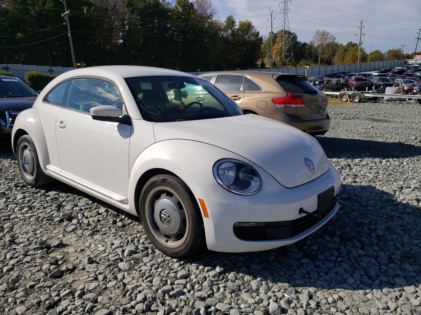 Photo 9 from auction – 2012 VOLKSWAGEN BEETLE with VIN 3VWJP7AT3CM611530