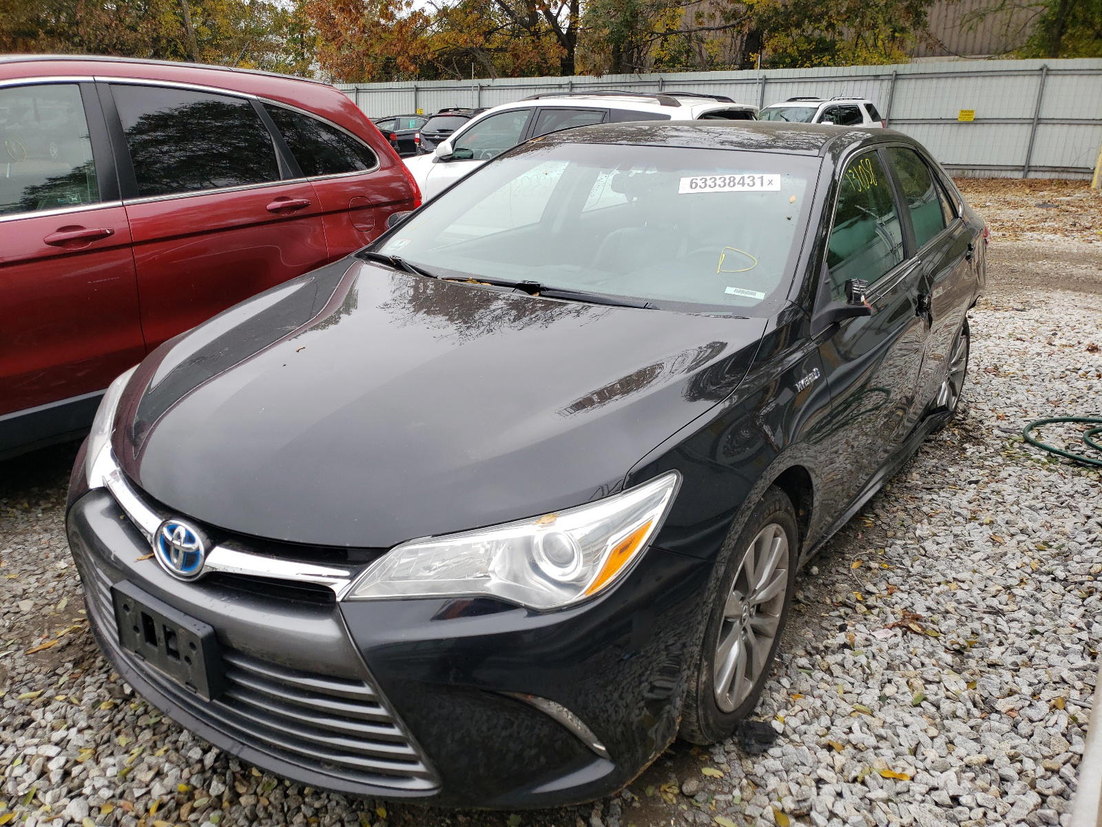 Photo 2 from auction – 2015 TOYOTA CAMRY HYBR with VIN 4T1BD1FK0FU166317