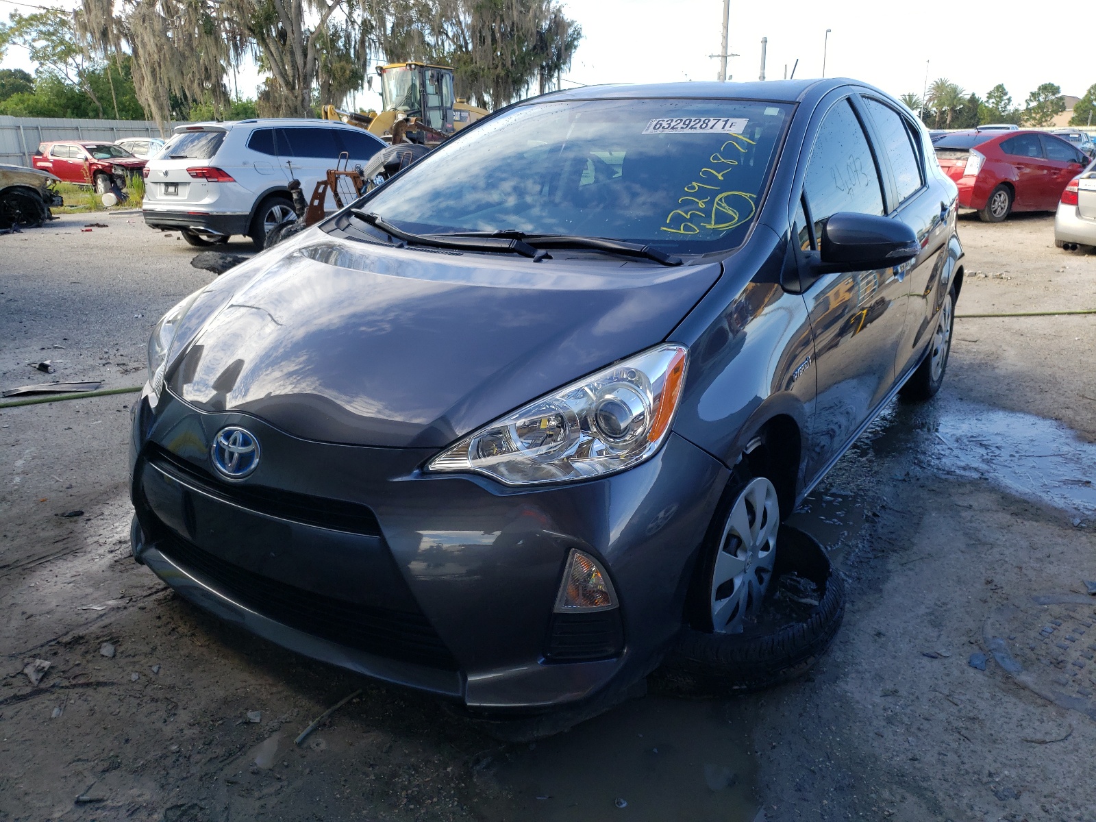 Photo 2 from auction – 2014 TOYOTA PRIUS C with VIN JTDKDTB31E1062322