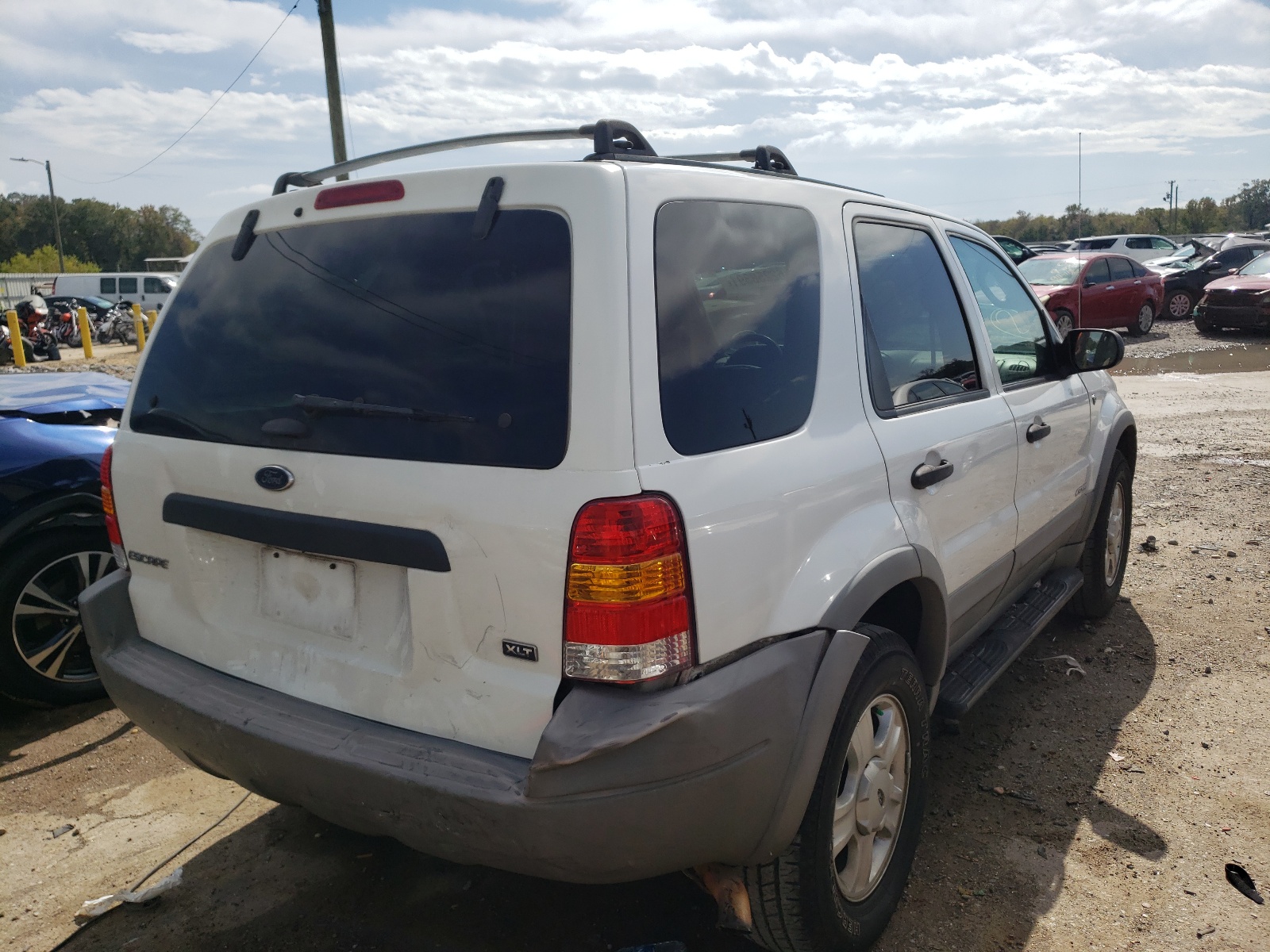 Photo 4 from auction – 2002 FORD ESCAPE XLT with VIN 1FMYU03142KB13108