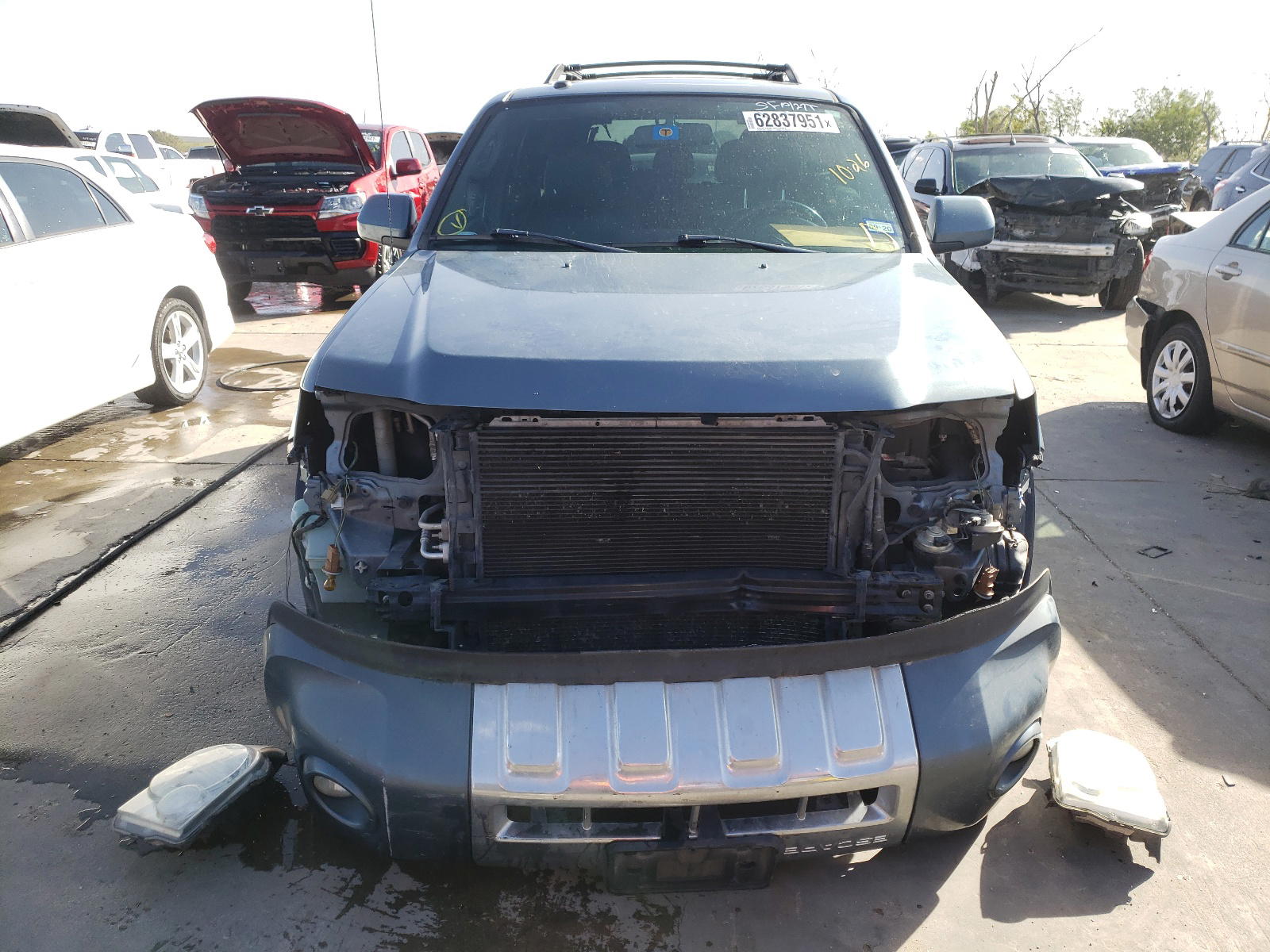 Photo 9 from auction – 2010 FORD ESCAPE LIM with VIN 1FMCU0E75AKD32363