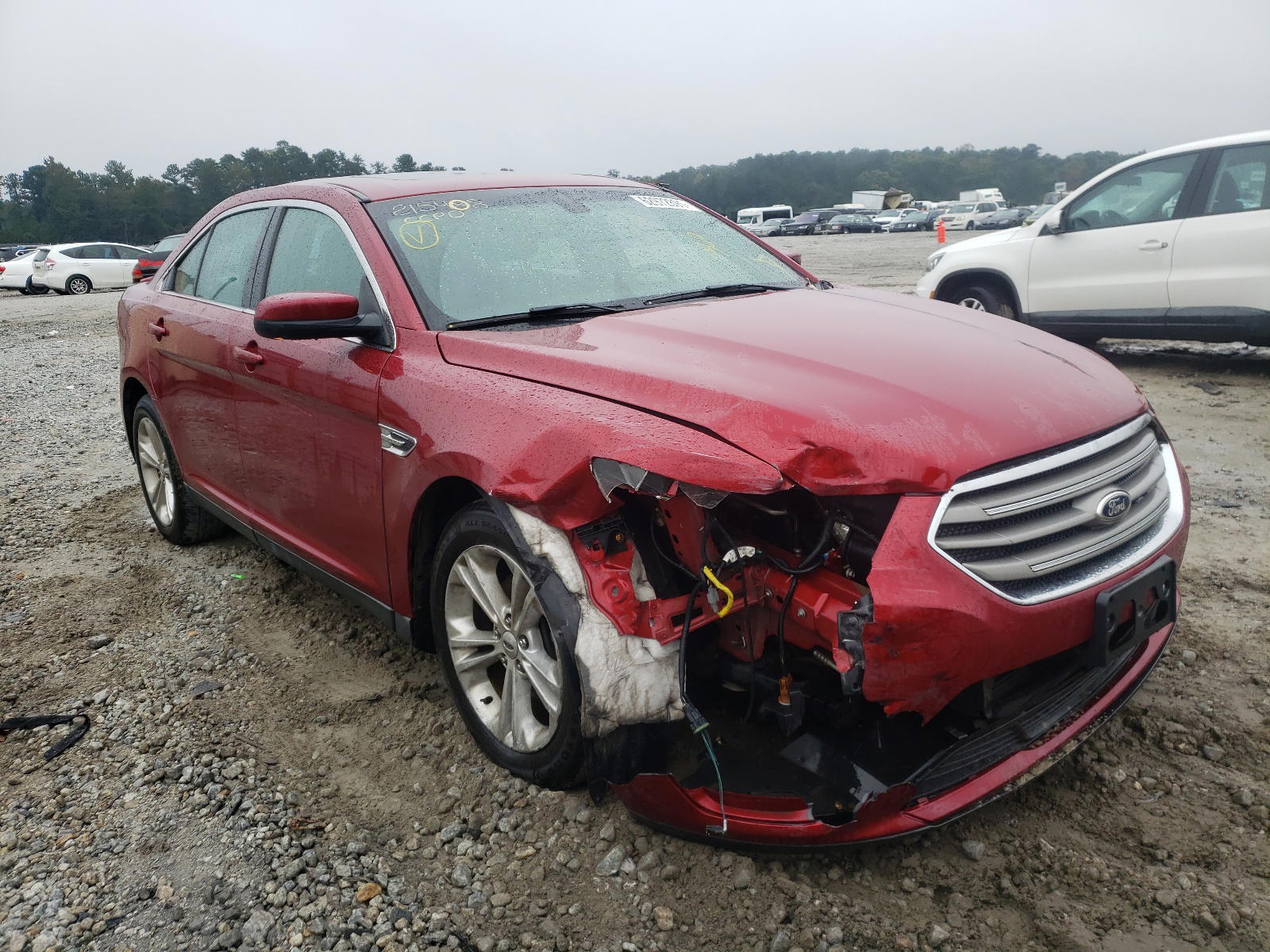 FORD TAURUS SEL 2014 with VIN 1FAHP2E99EG152316 - Photo from auction