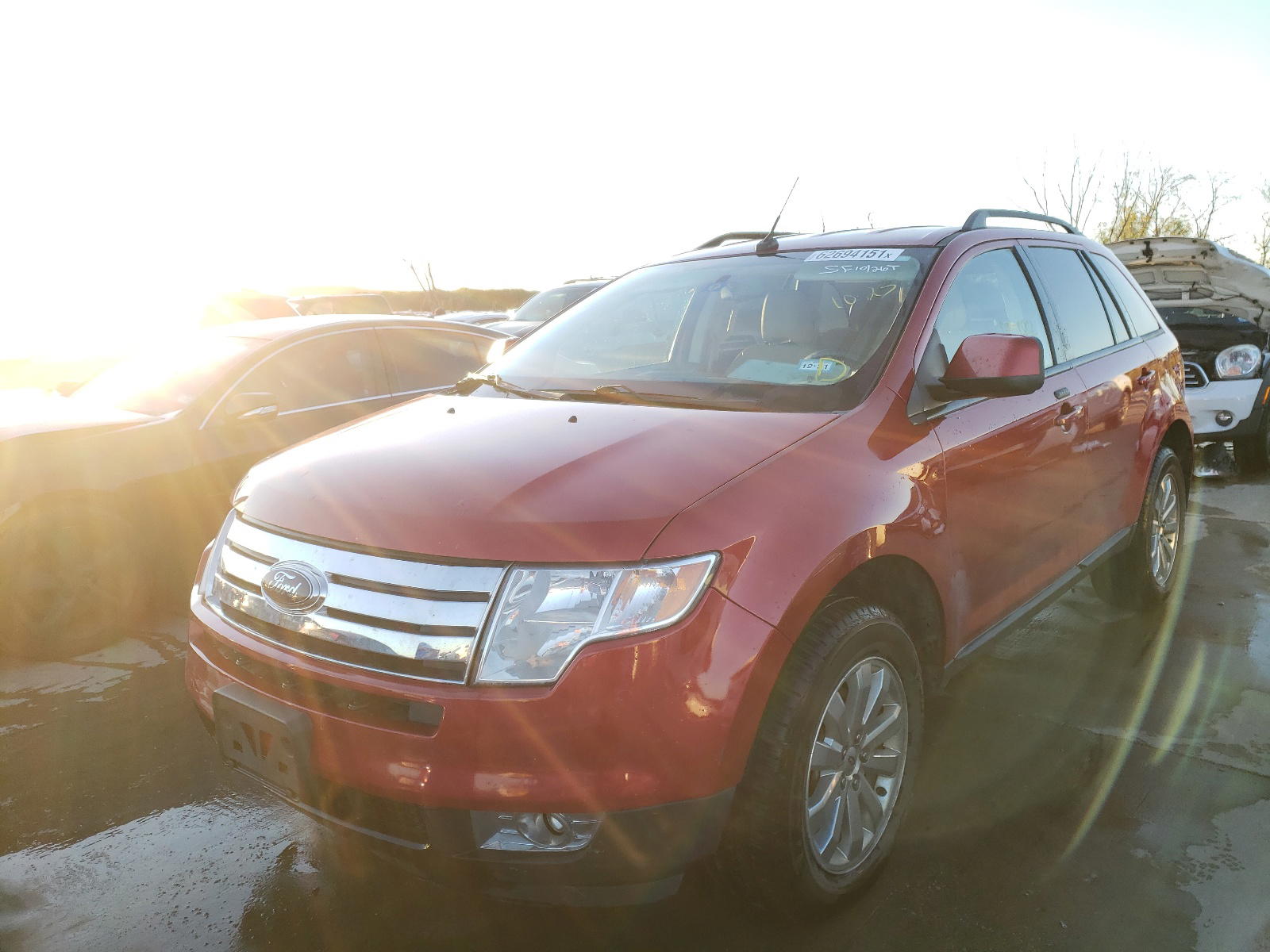 Photo 2 from auction – 2010 FORD EDGE SEL with VIN 2FMDK3JC0ABA22713