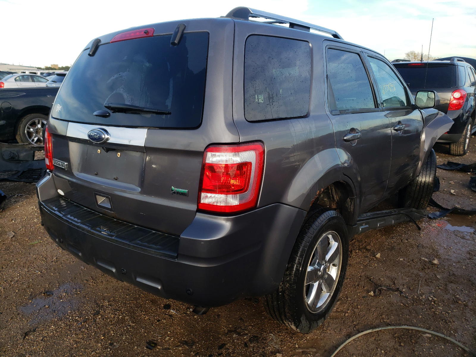 Photo 4 from auction – 2011 FORD ESCAPE LIM with VIN 1FMCU9EG6BKB11036