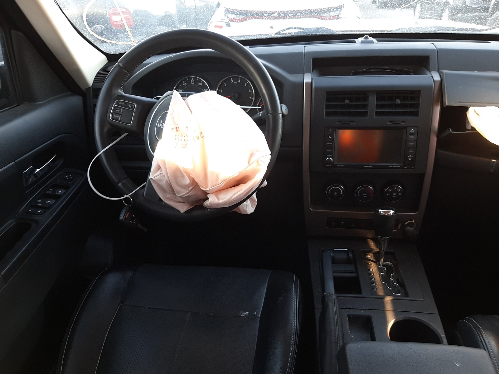 Photo 9 from auction – 2012 JEEP LIBERTY SP with VIN 1C4PJMAK9CW170829