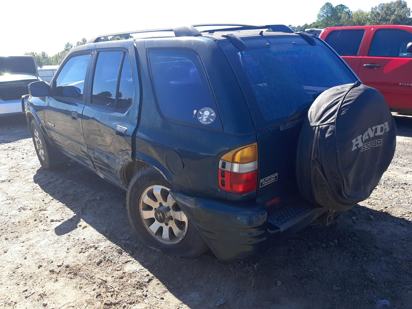 Photo 3 from auction – 2001 HONDA PASSPORT E with VIN 4S6DM58W214408752