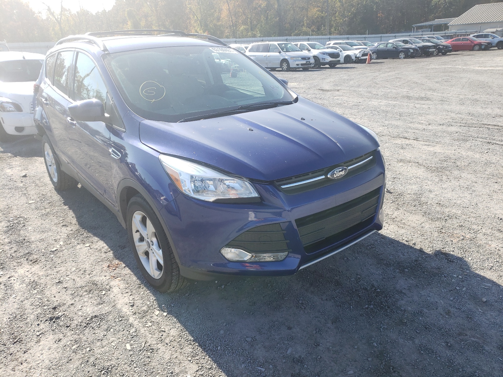 FORD ESCAPE SE 2014 with VIN 1FMCU9GX1EUE05899 - Photo from auction