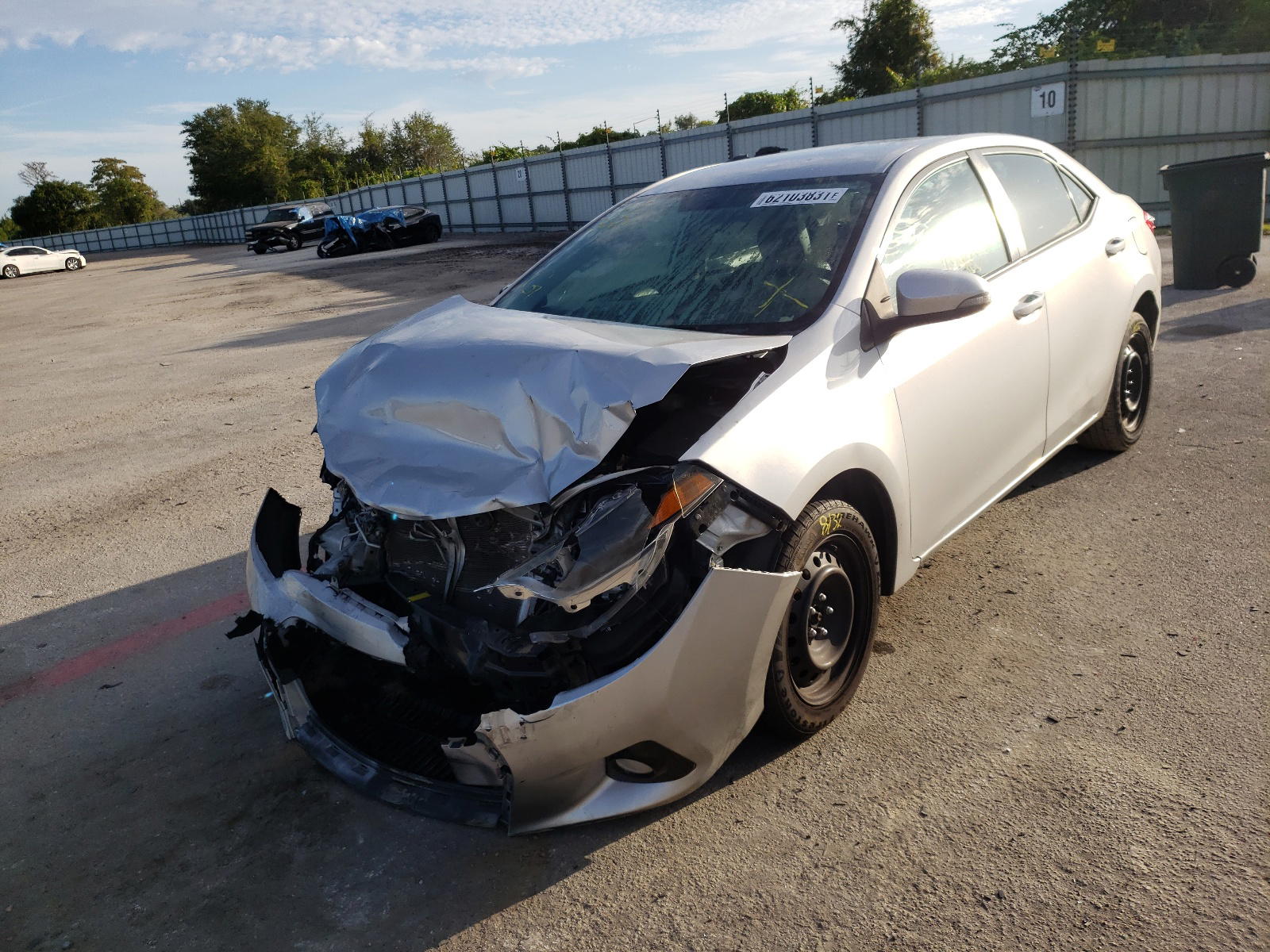 Photo 2 from auction – 2016 TOYOTA COROLLA L with VIN 5YFBURHE7GP463898