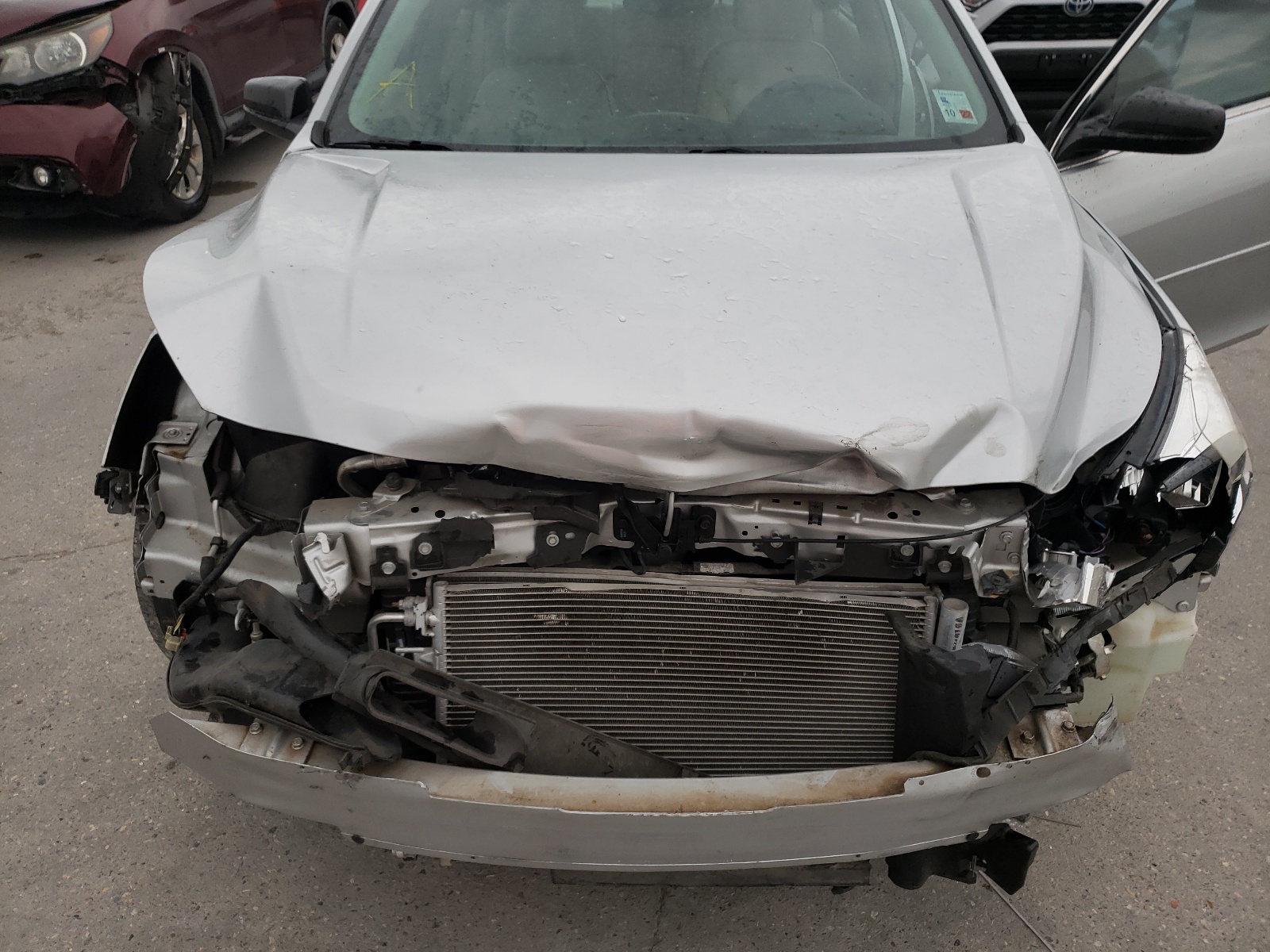 Photo 7 from auction – 2014 CHEVROLET MALIBU LS with VIN 1G11B5SL5EF145891