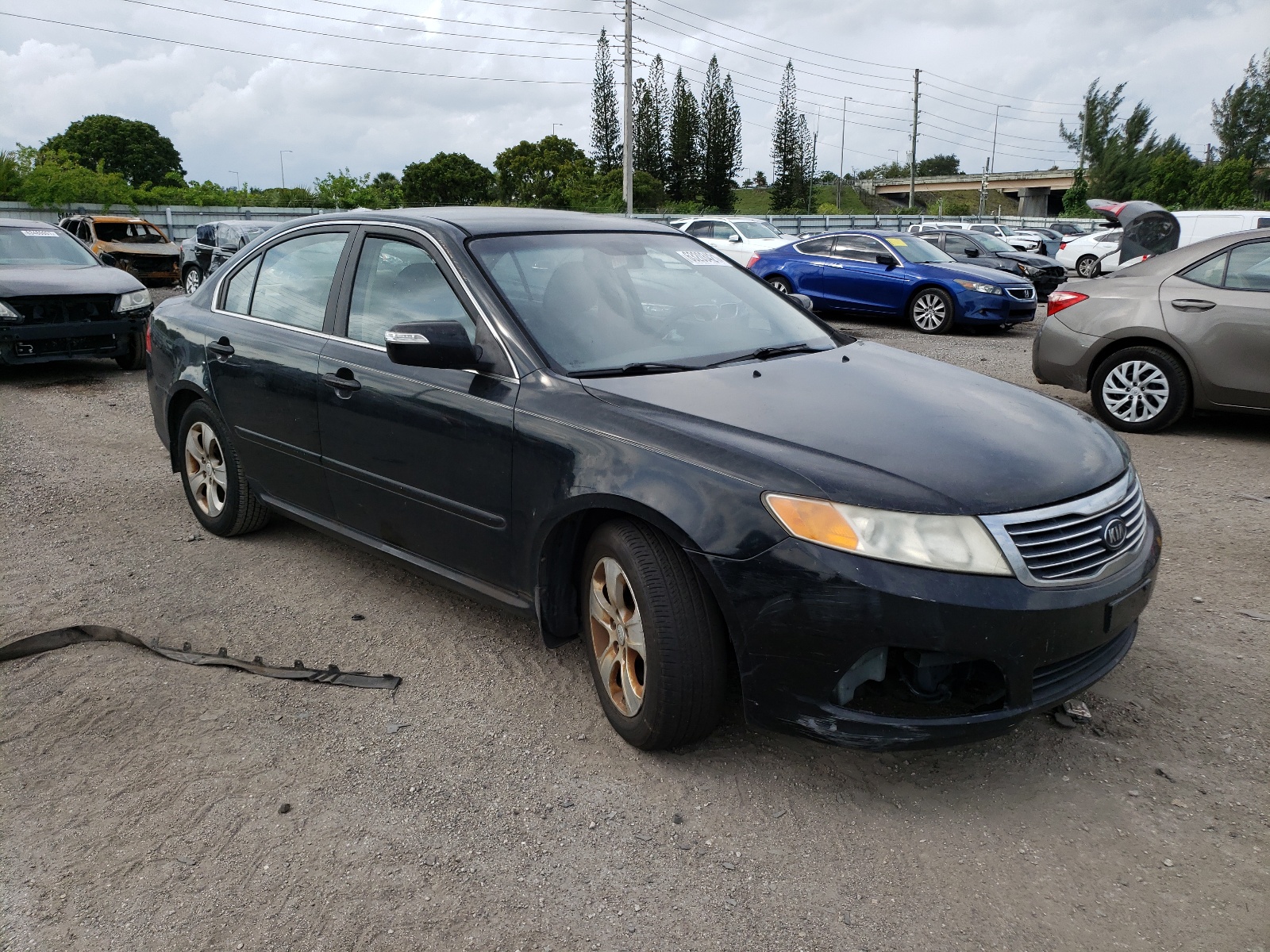 KIA OPTIMA 2009 with VIN KNAGE228895310215 - Photo from auction