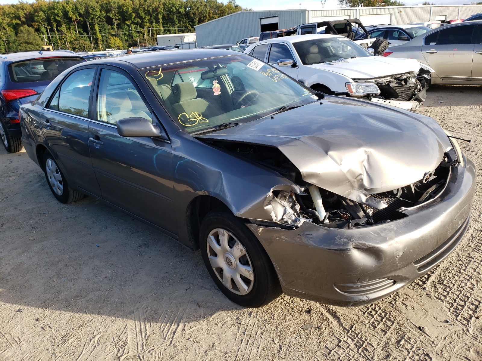 TOYOTA CAMRY LE 2004 with VIN 4T1BE32K74U933981 - Photo from auction