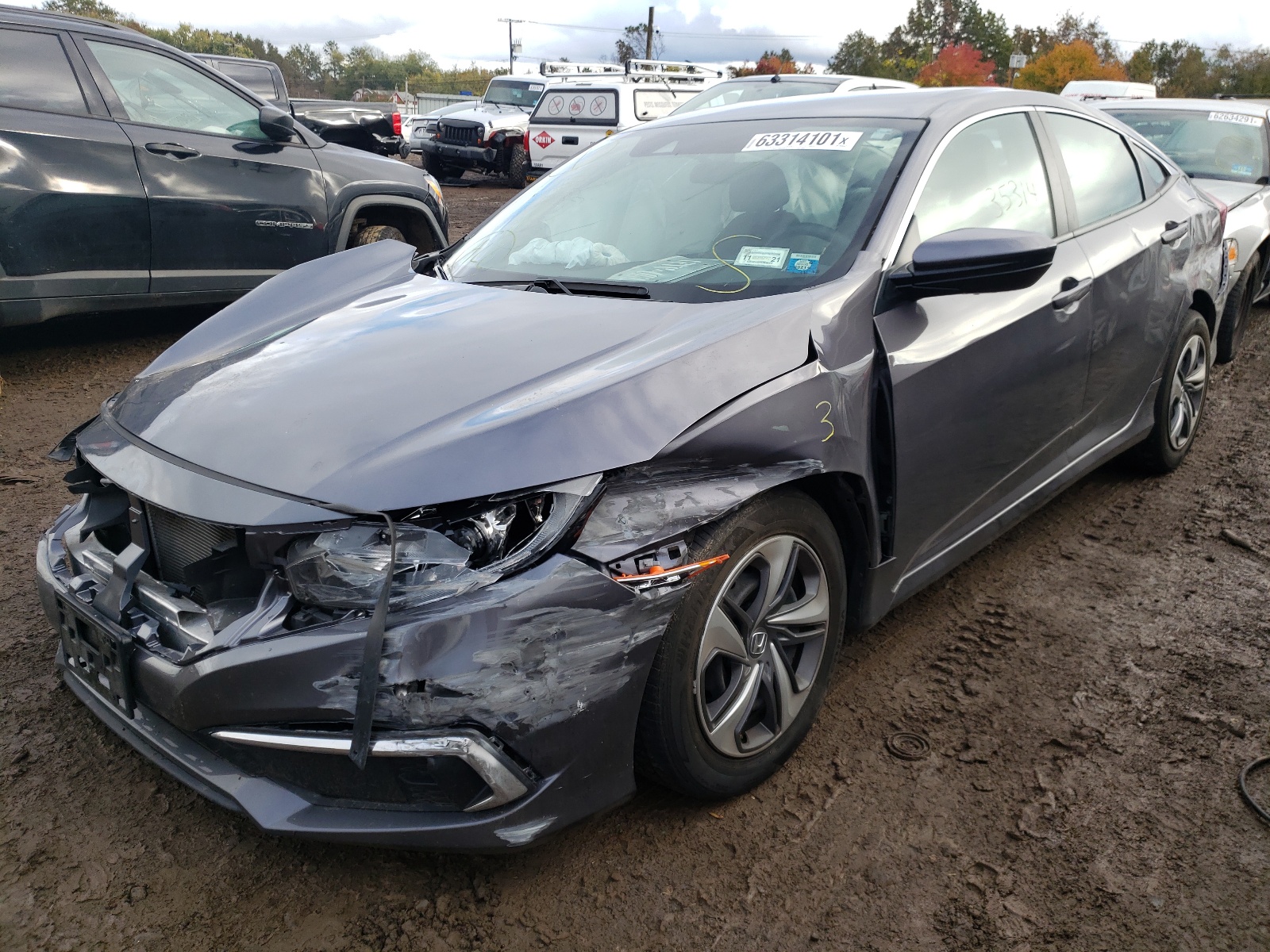 Photo 2 from auction – 2019 HONDA CIVIC LX with VIN 2HGFC2F62KH590291