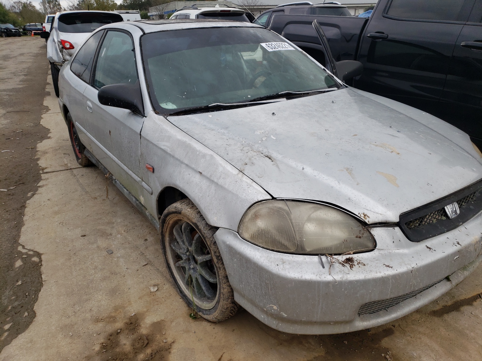 HONDA CIVIC 2000 with VIN 1HGEJ8145YL007573 - Photo from auction
