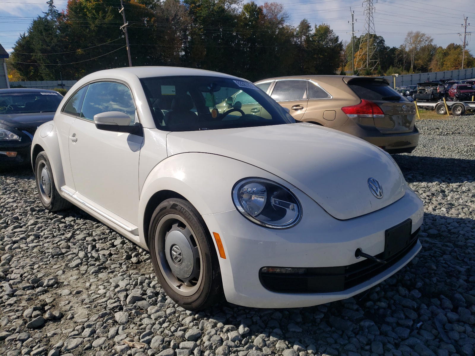 VOLKSWAGEN BEETLE 2012 with VIN 3VWJP7AT3CM611530 - Photo from auction