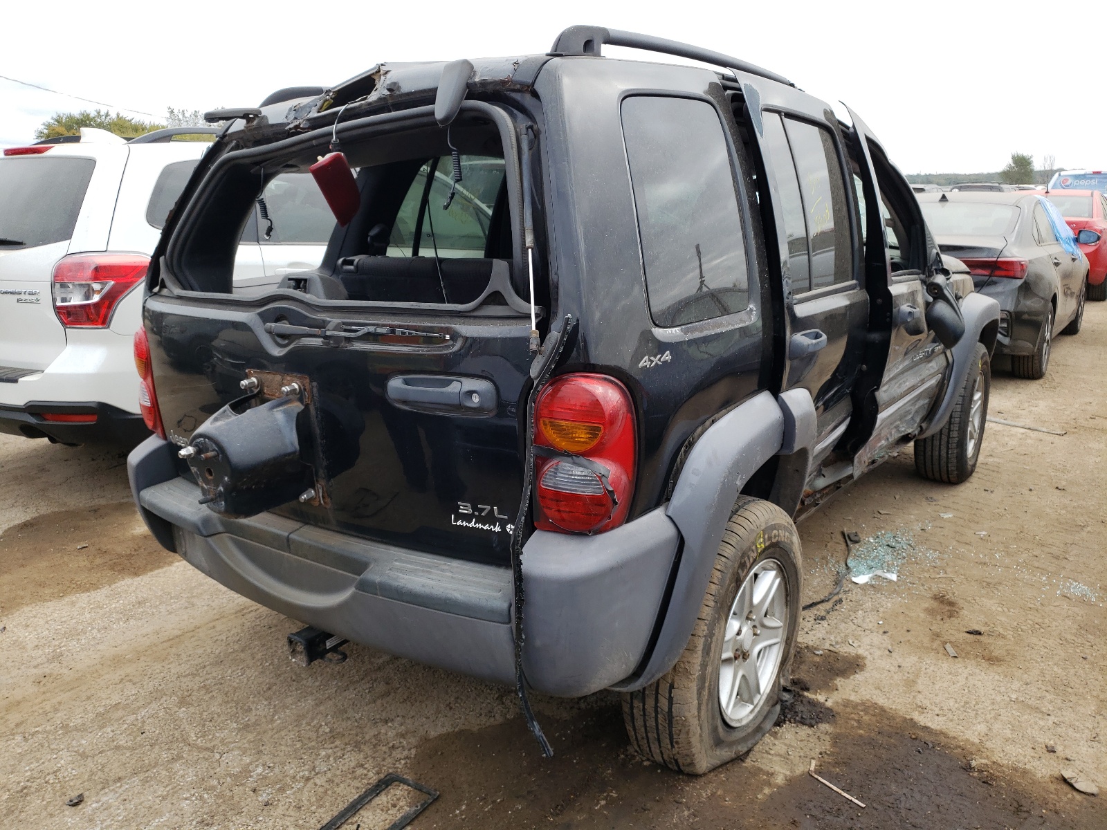 Photo 4 from auction – 2002 JEEP LIBERTY SP with VIN 1J4GL48K92W281437