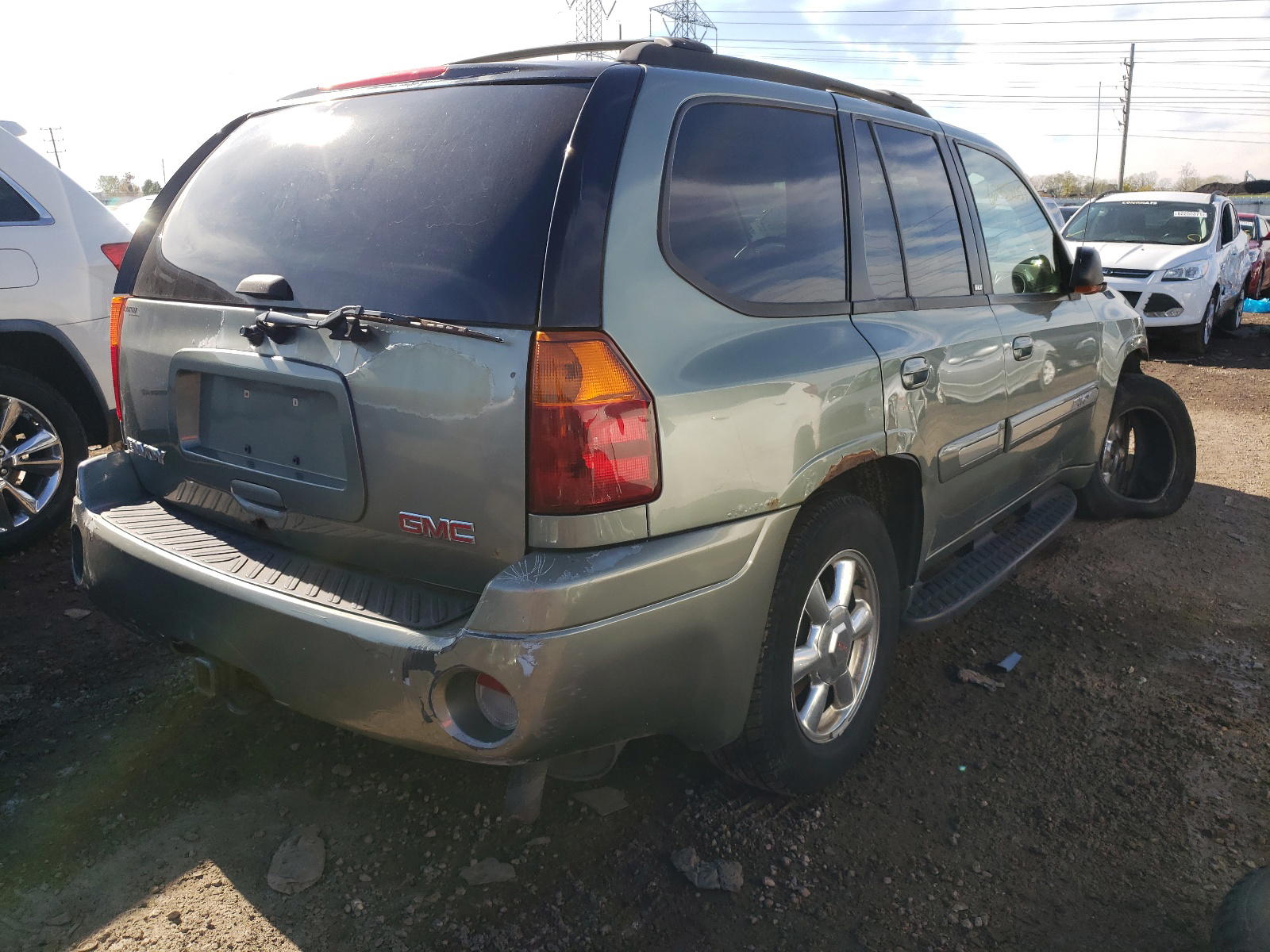 Photo 4 from auction – 2004 GMC ENVOY with VIN 1GKDT13S942437652