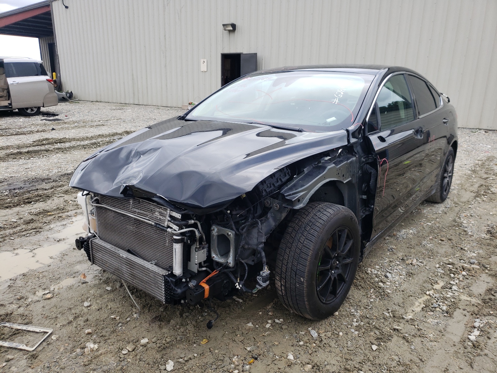 Photo 2 from auction – 2019 FORD FUSION TIT with VIN 3FA6P0K96KR234332
