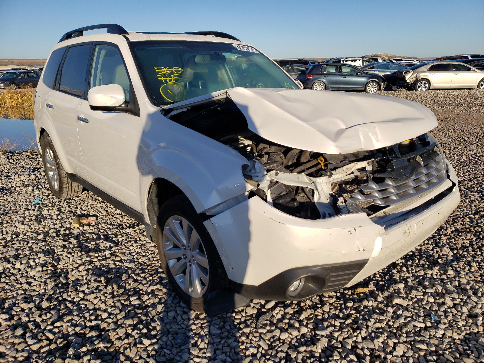 SUBARU FORESTER 2012 with VIN JF2SHADC5CH404138 - Photo from auction