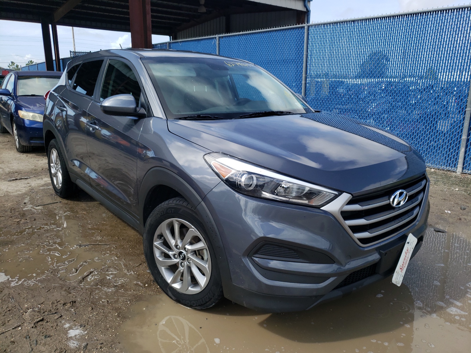 HYUNDAI TUCSON SE 2018 with VIN KM8J2CA40JU754801 - Photo from auction