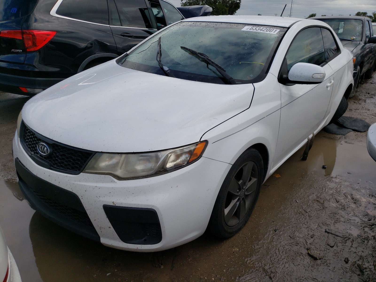 Photo 2 from auction – 2010 KIA FORTE EX with VIN KNAFU6A27A5168379