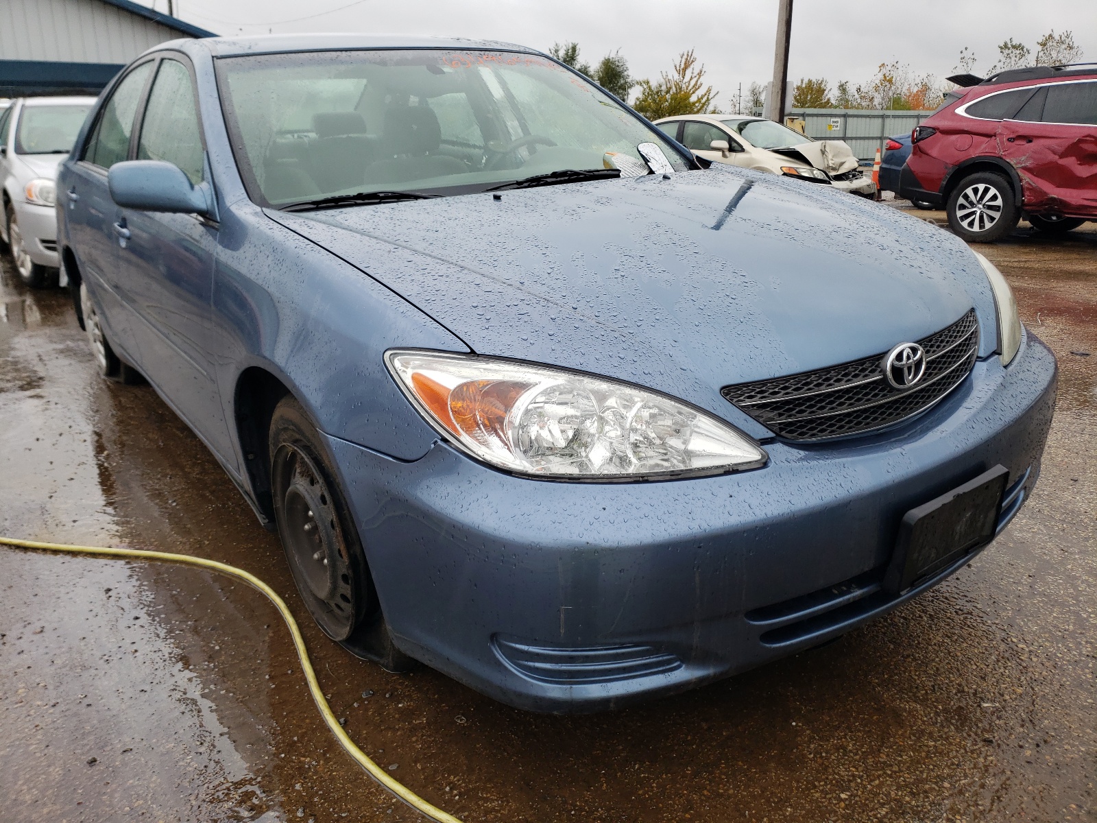 TOYOTA CAMRY LE 2002 with VIN 4T1BE32K12U616646 - Photo from auction