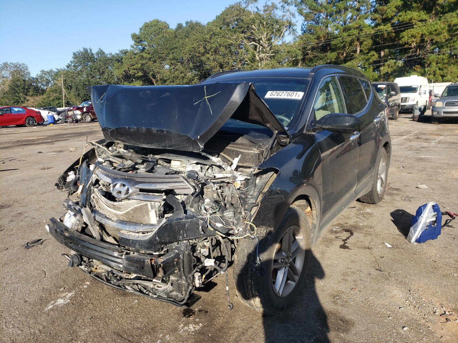 Photo 2 from auction – 2017 HYUNDAI SANTA FE S with VIN 5NMZU3LB2HH040800