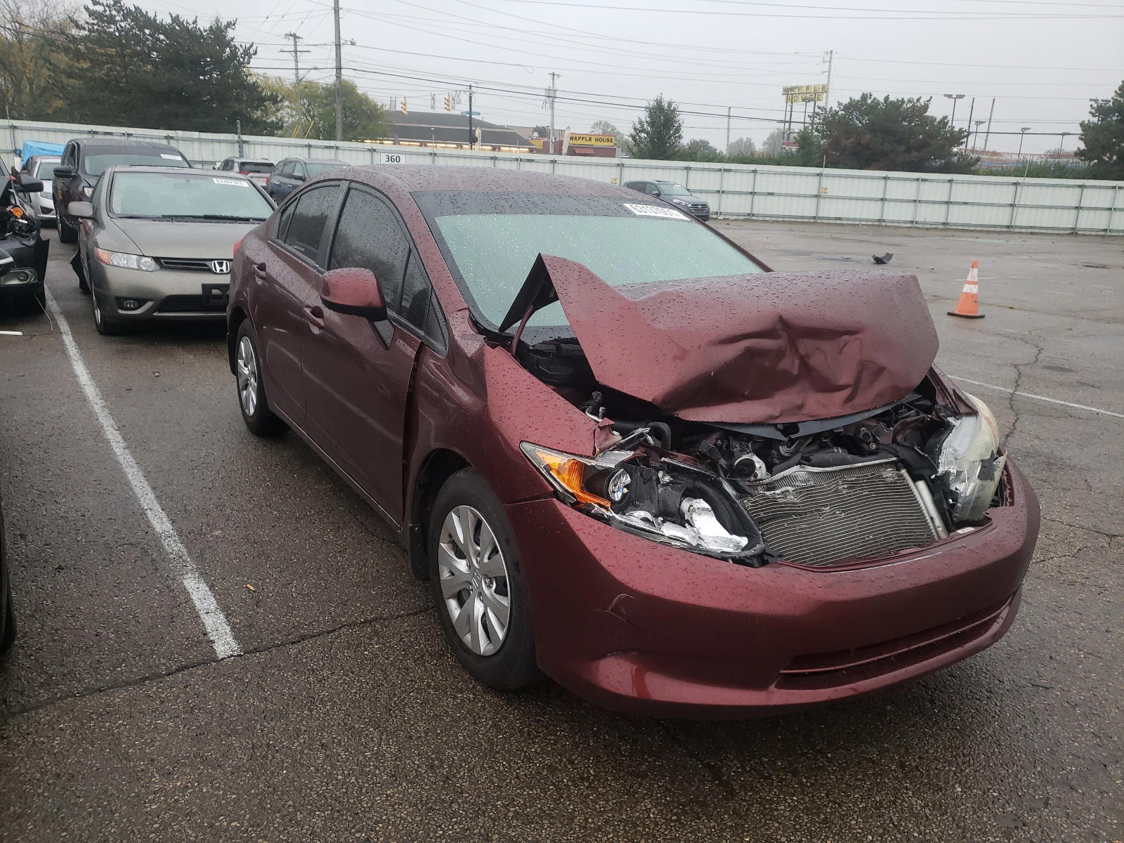 HONDA CIVIC LX 2012 with VIN 19XFB2F52CE031524 - Photo from auction