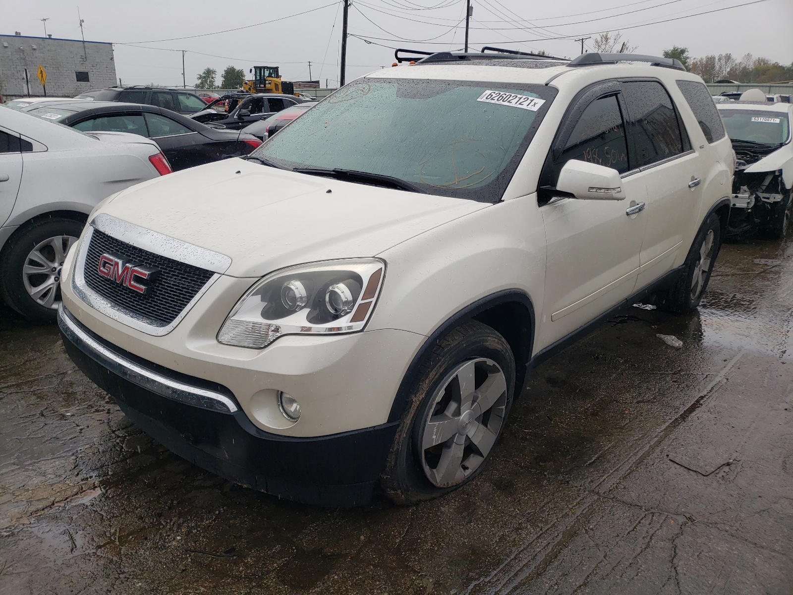 Photo 2 from auction – 2011 GMC ACADIA SLT with VIN 1GKKRSED0BJ125670