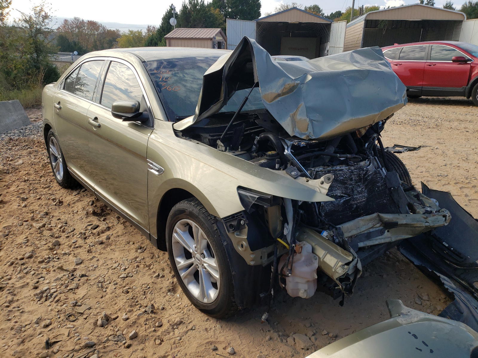 FORD TAURUS SEL 2013 with VIN 1FAHP2E80DG105617 - Photo from auction