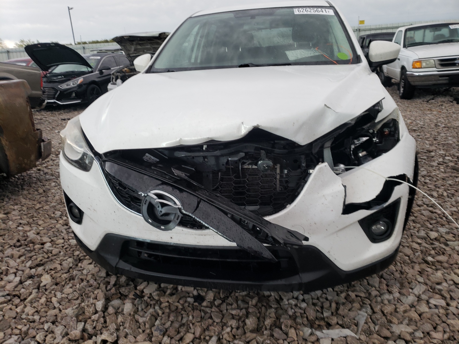 Photo 9 from auction – 2014 MAZDA CX-5 TOURI with VIN JM3KE4CY9E0387794
