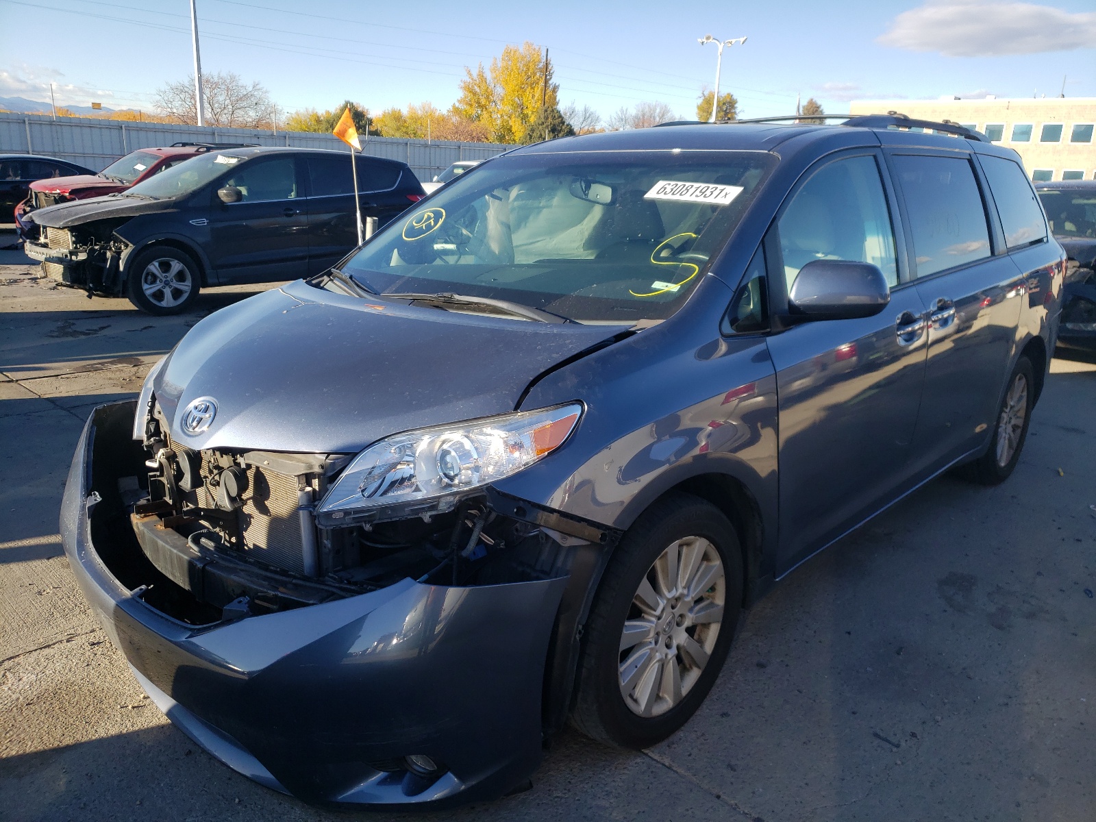 Photo 2 from auction – 2015 TOYOTA SIENNA XLE with VIN 5TDDK3DC7FS102452