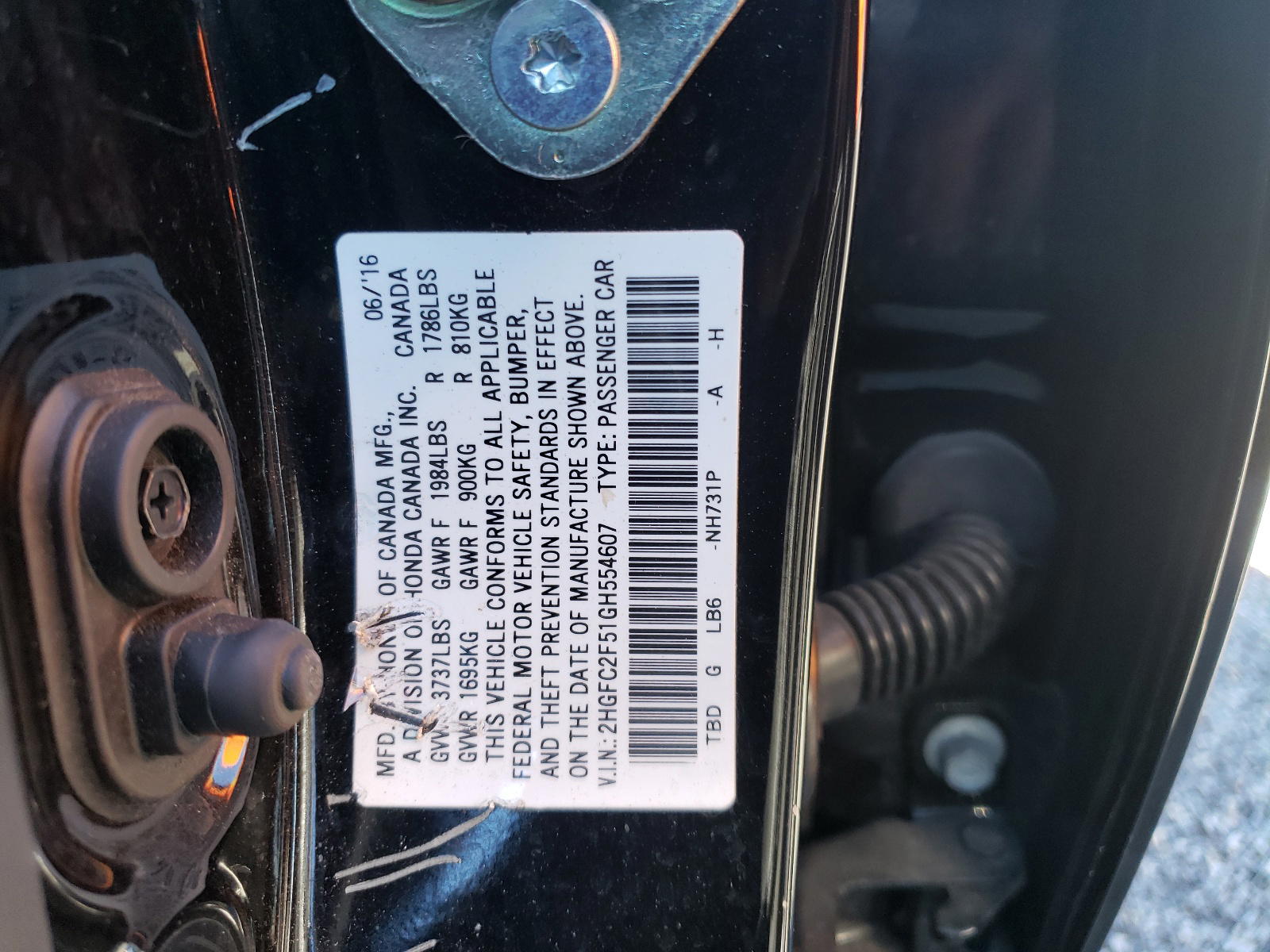 Photo 10 from auction – 2016 HONDA CIVIC LX with VIN 2HGFC2F51GH554607