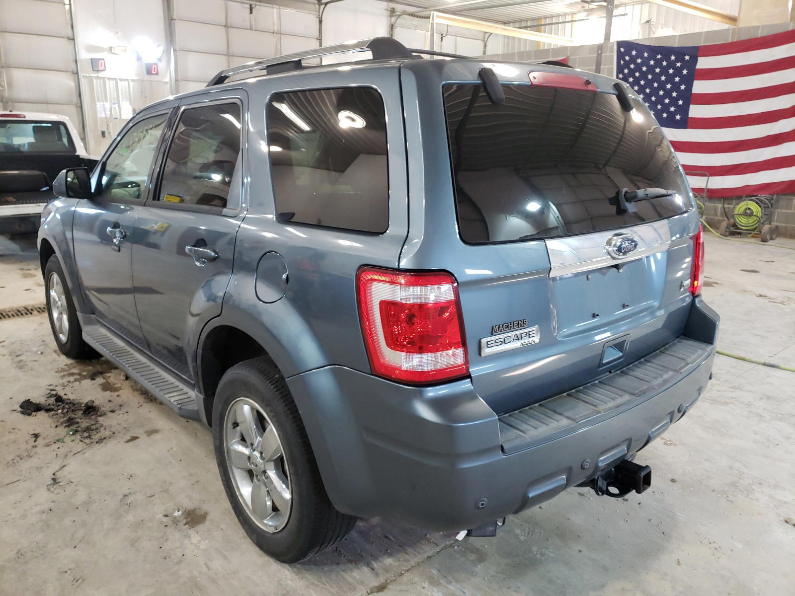 Photo 3 from auction – 2011 FORD ESCAPE LIM with VIN 1FMCU9EG4BKA55873