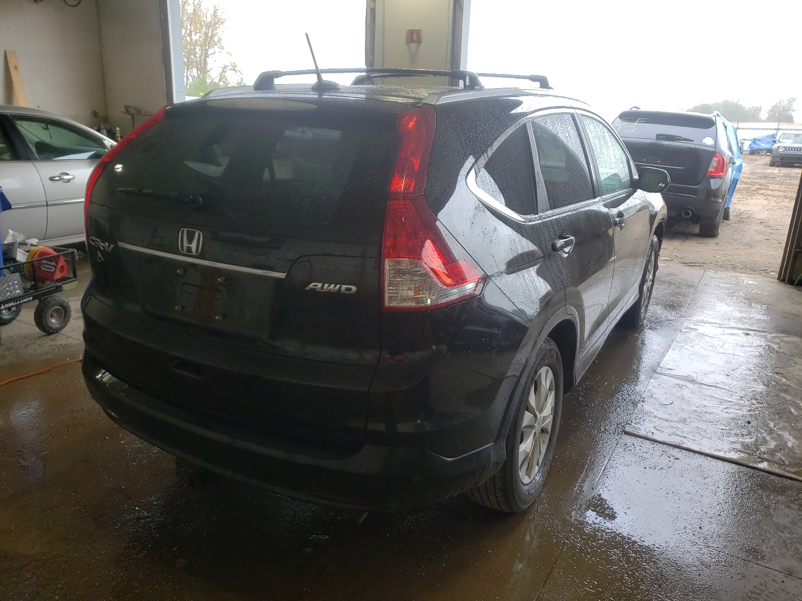 Photo 4 from auction – 2012 HONDA CR-V EXL with VIN 5J6RM4H76CL013627
