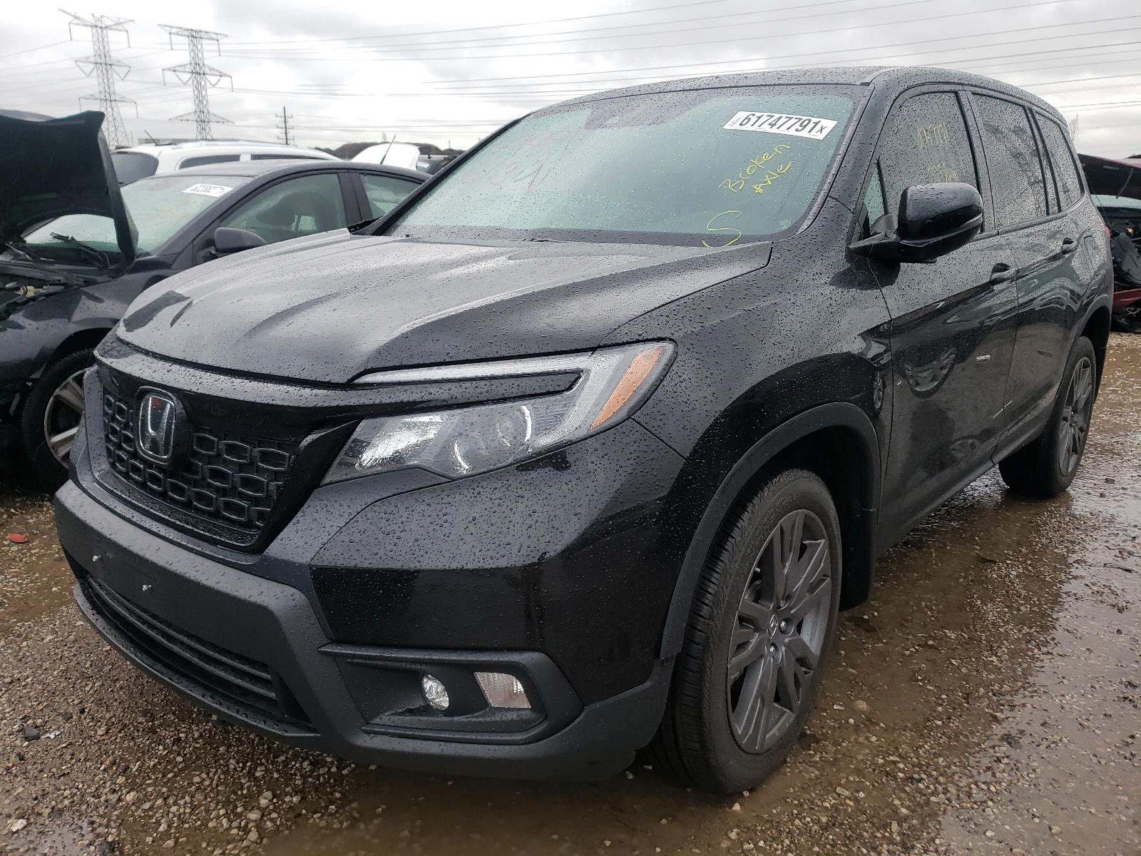 Photo 2 from auction – 2020 HONDA PASSPORT E with VIN 5FNYF8H50LB020898