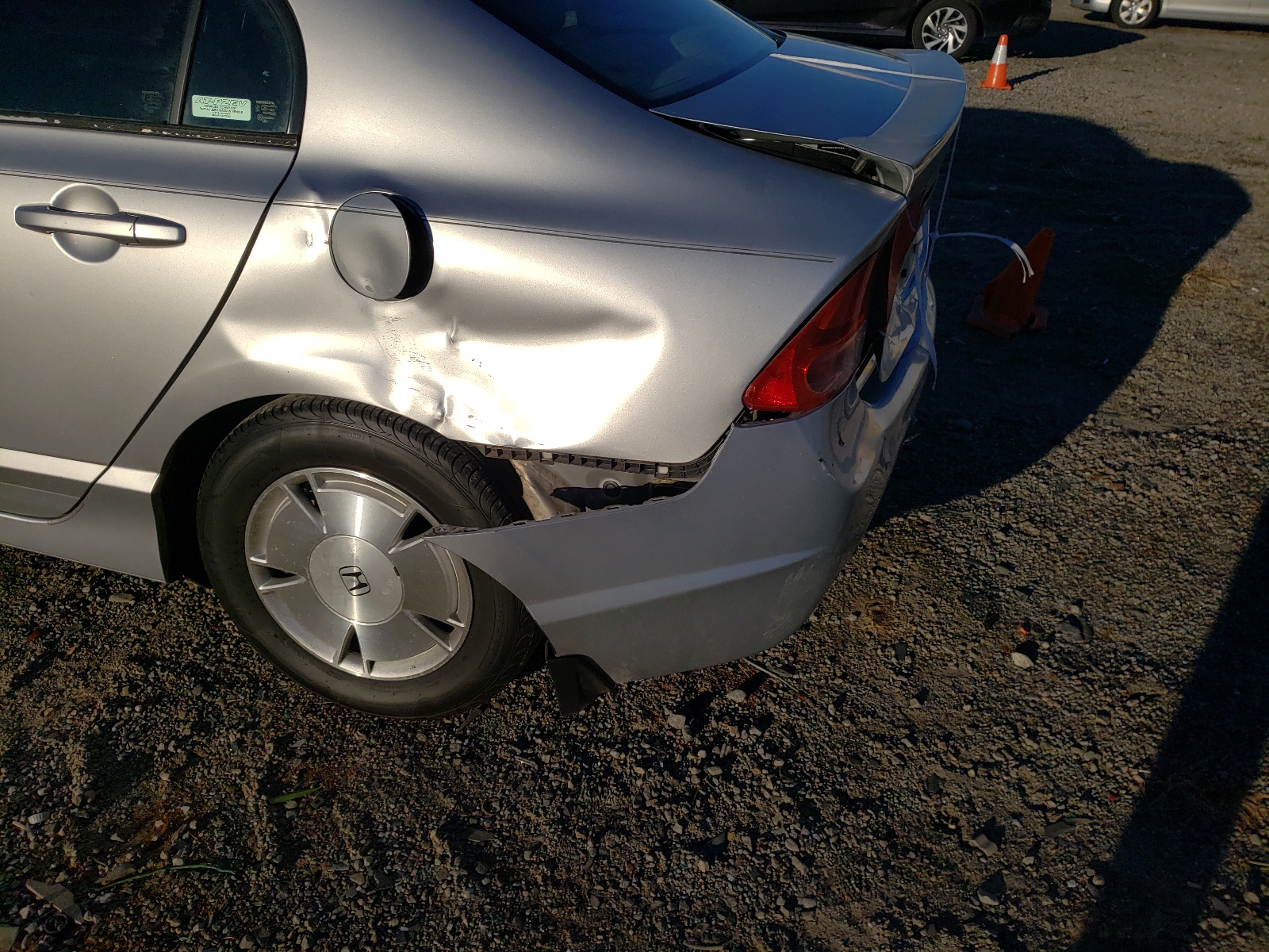 Photo 9 from auction – 2006 HONDA CIVIC HYBR with VIN JHMFA36276S008108
