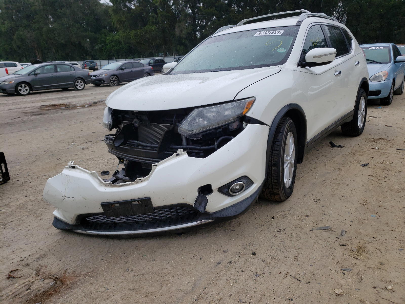 Photo 2 from auction – 2015 NISSAN ROGUE S with VIN 5N1AT2MT7FC767147