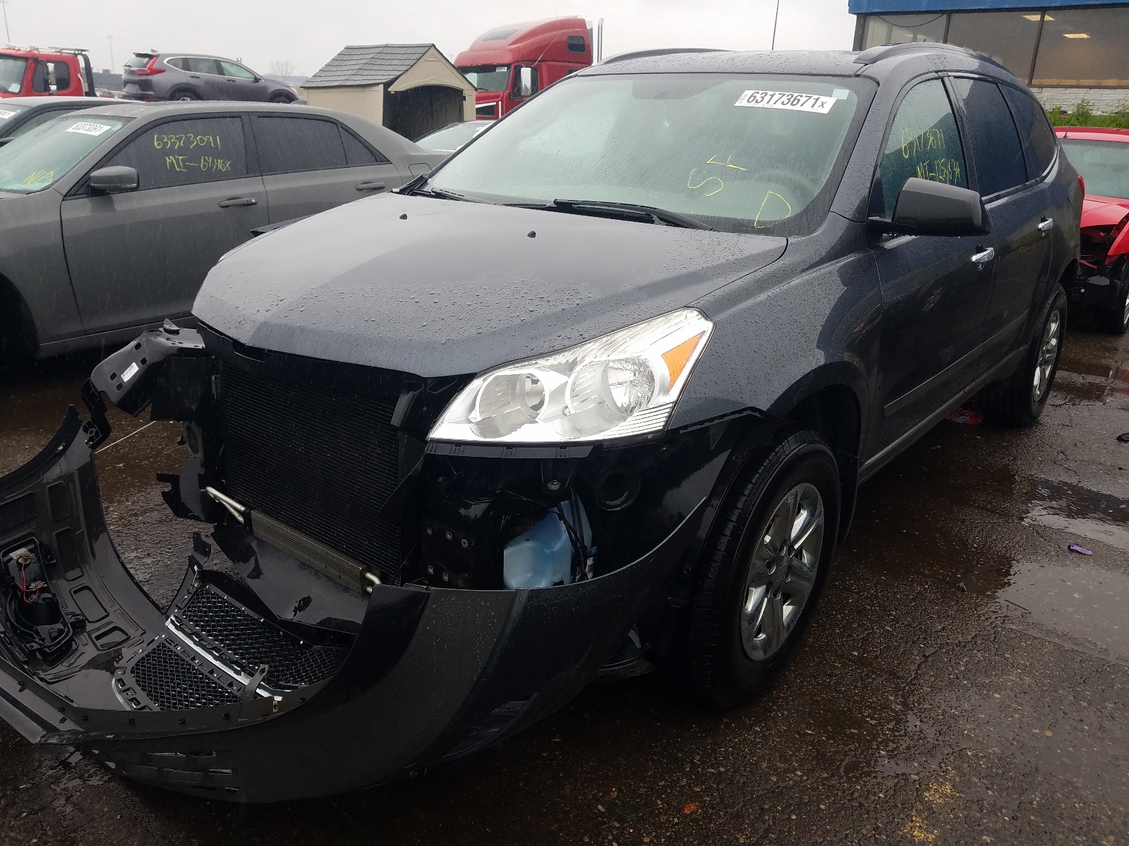 Foto 2 de la subasta – 2012 CHEVROLET TRAVERSE L con VIN 1GNKRFED0CJ388771