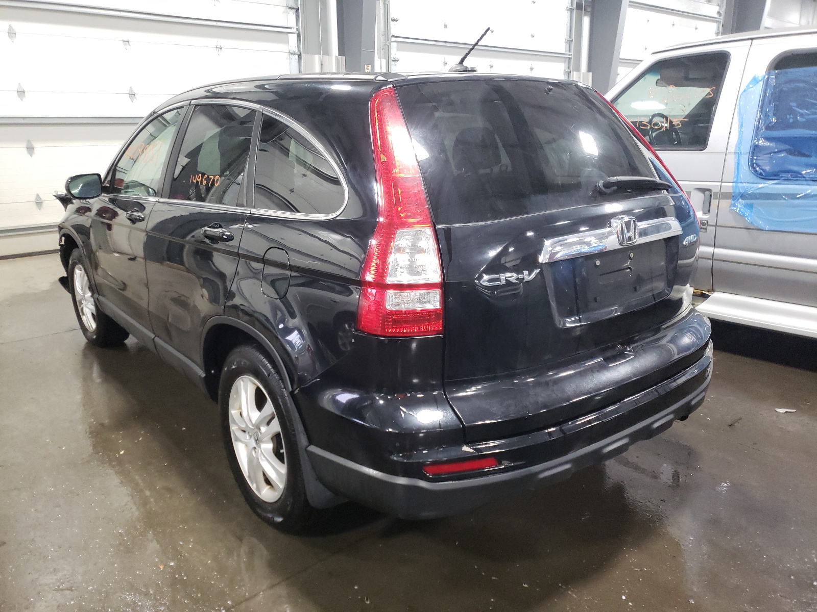 Photo 3 from auction – 2011 HONDA CR-V EXL with VIN 5J6RE4H75BL041799