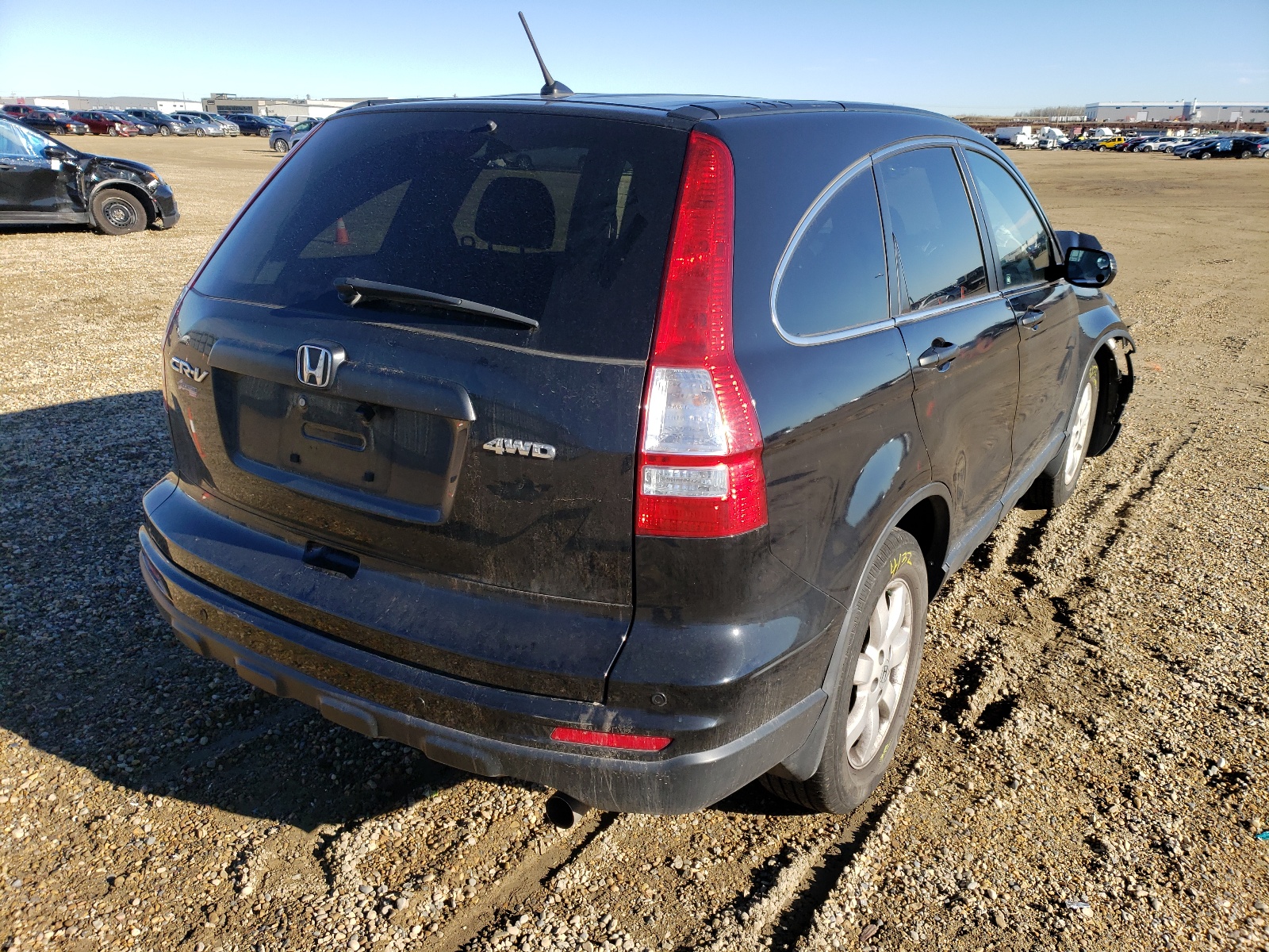 Photo 4 from auction – 2011 HONDA CR-V LX with VIN 5J6RE4H36BL811490