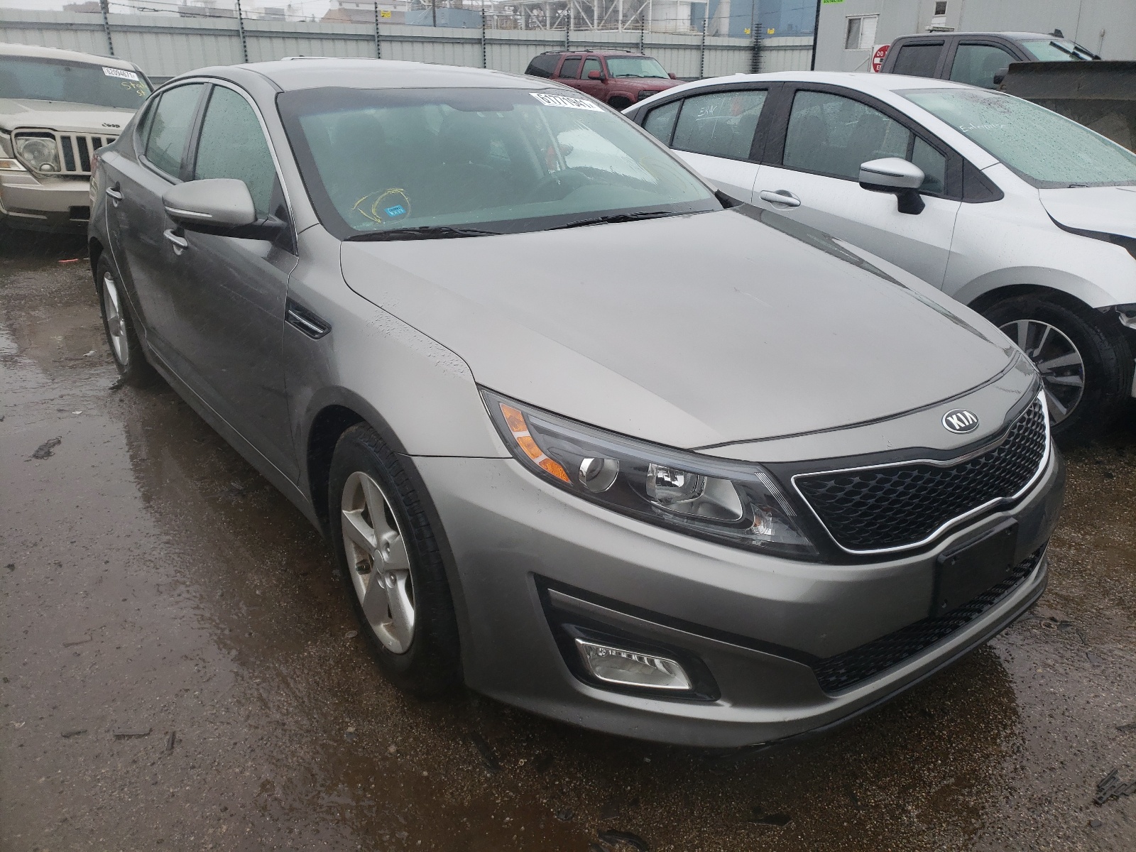KIA OPTIMA LX 2015 with VIN 5XXGM4A7XFG517867 - Photo from auction